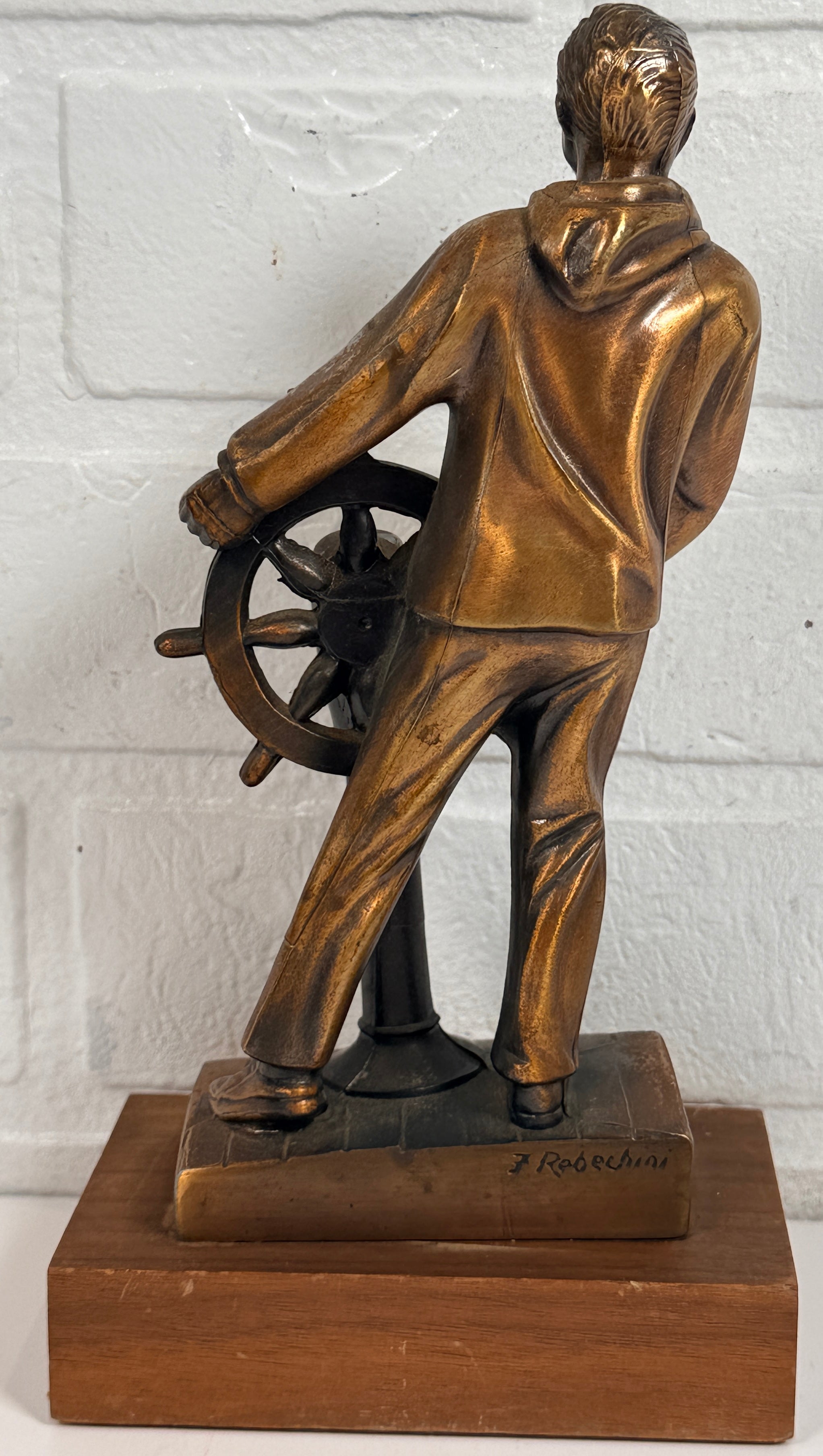 Vintage 1969 sailor helm award statue with bronze finish on wood base. Nautical décor piece with plaque, ideal for maritime collectors or mid-century display