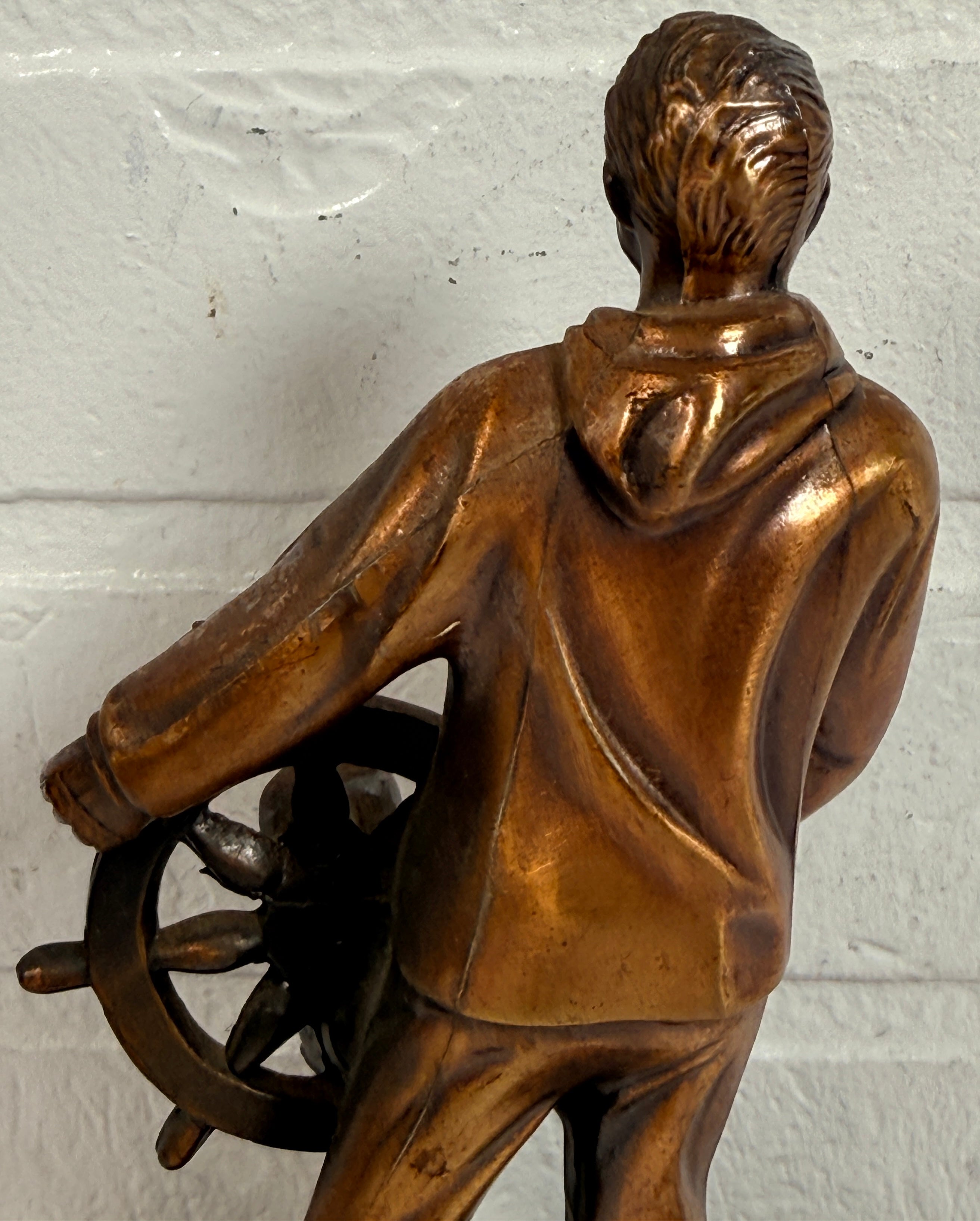 Vintage 1969 sailor helm award statue with bronze finish on wood base. Nautical décor piece with plaque, ideal for maritime collectors or mid-century display