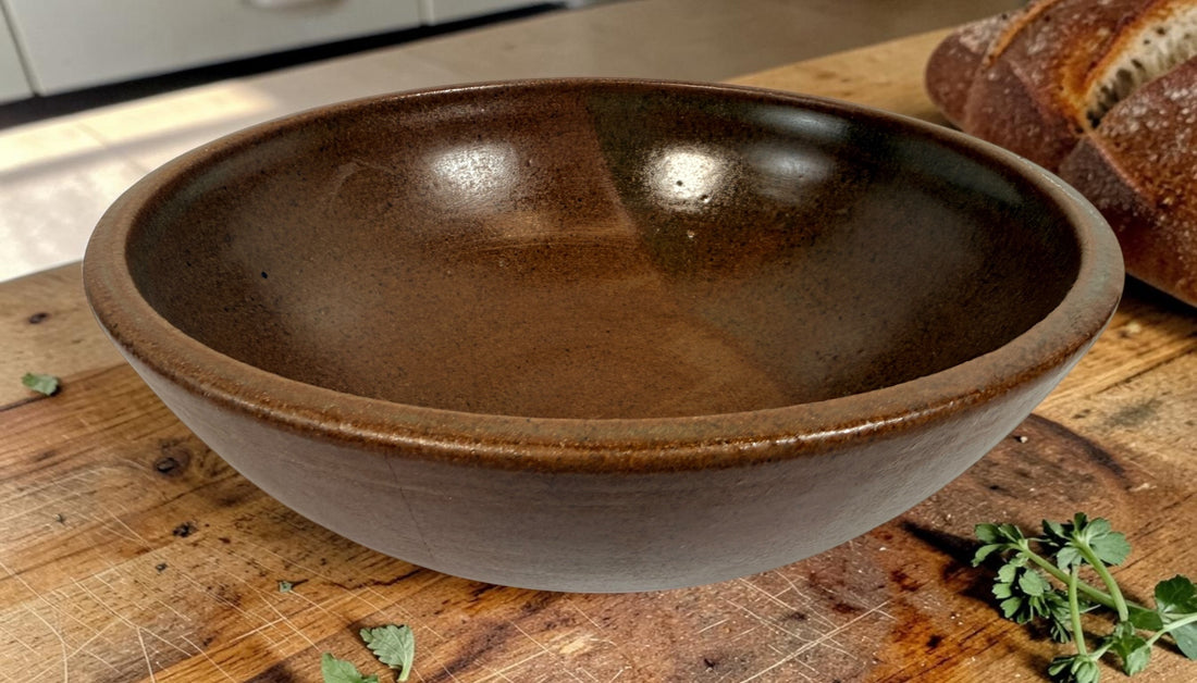 Vintage Canadian studio pottery stoneware bowl with earthy brown glaze and handmade rustic modern design. Ideal centerpiece or functional décor piece.