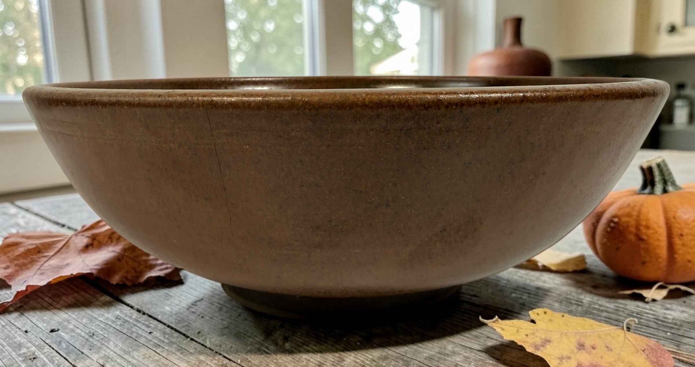 Vintage Canadian studio pottery stoneware bowl with earthy brown glaze and handmade rustic modern design. Ideal centerpiece or functional décor piece.