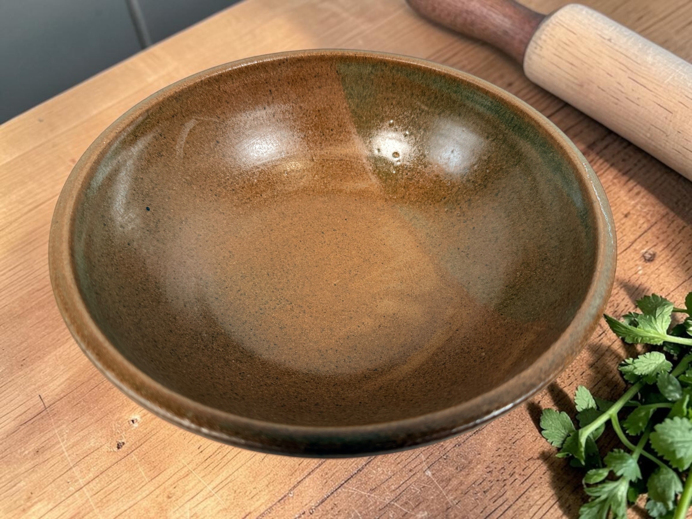 Vintage Canadian studio pottery stoneware bowl with earthy brown glaze and handmade rustic modern design. Ideal centerpiece or functional décor piece.