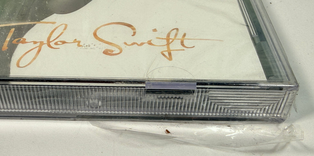 Taylor Swift Speak Now World Tour Live CD DVD 2011 with partial seal. Includes full concert film and bonus content. Great collector copy.