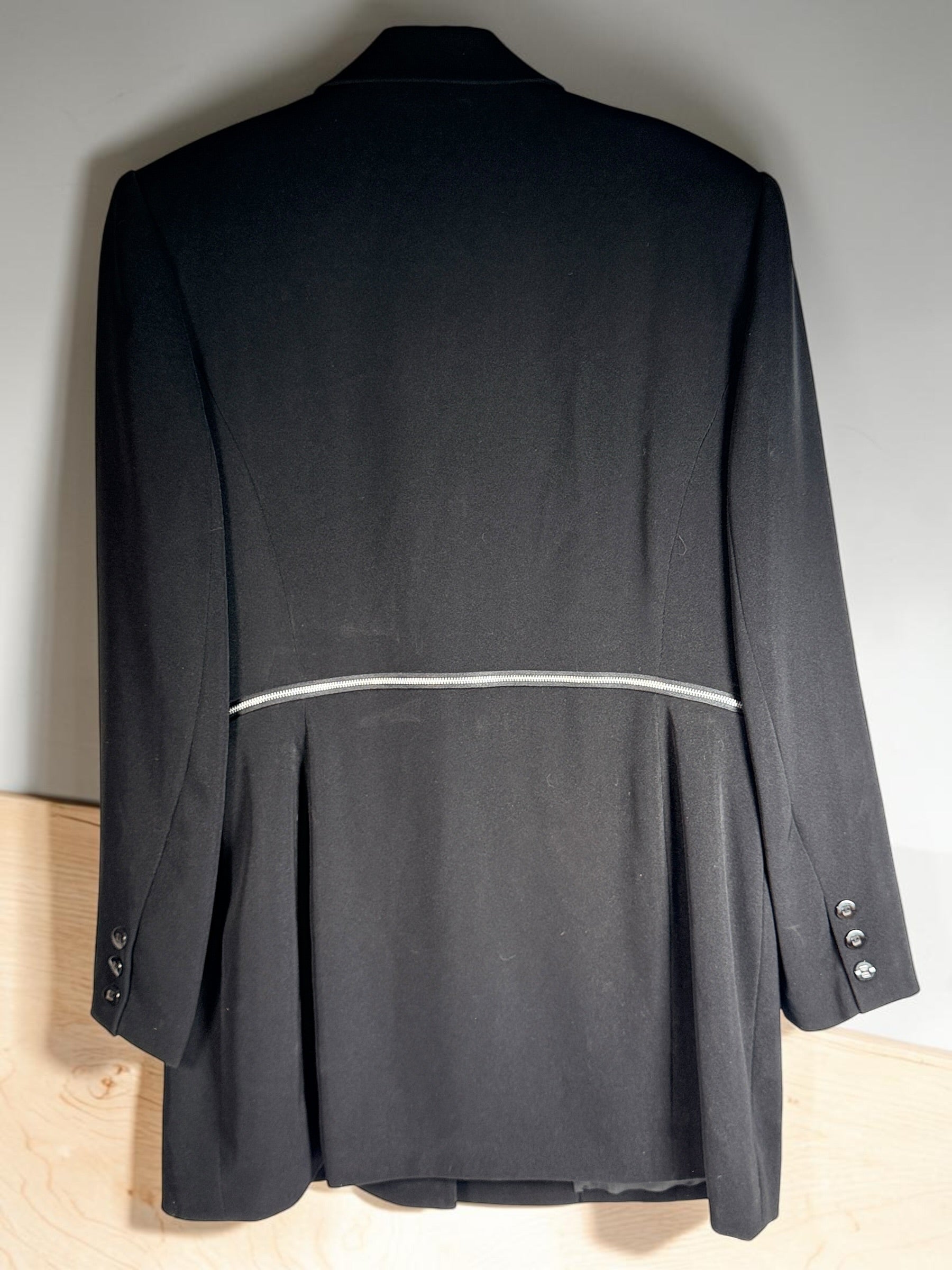 Vintage Simon Chang black blazer with zip waist detail, structured 90s silhouette, size 12. Classic tailored piece with unique design accent.
