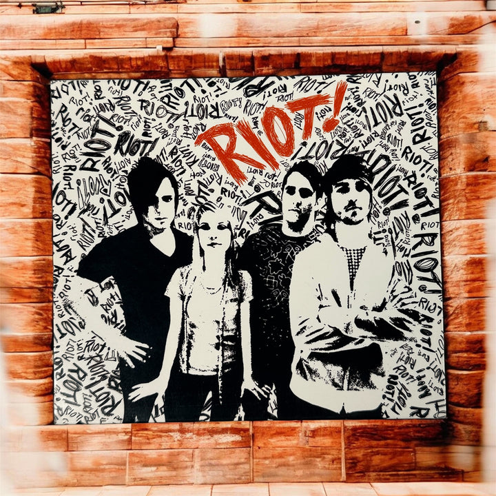 Paramore Riot MVI CD DVD set 2007 interactive edition with booklet and inserts. Collectible alternative rock release from Fueled By Ramen.