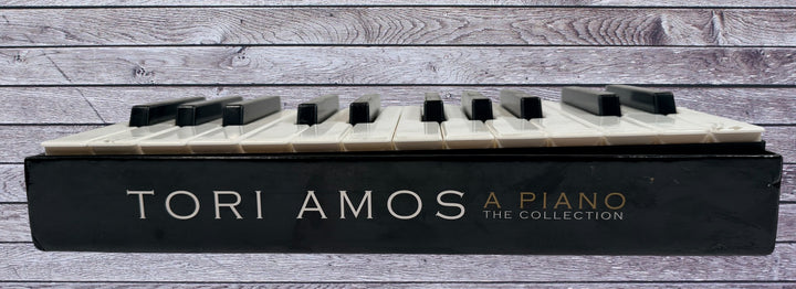 Complete Tori Amos A Piano The Collection 5CD deluxe Rhino box set with piano-key packaging and bonus B-sides in very good condition.