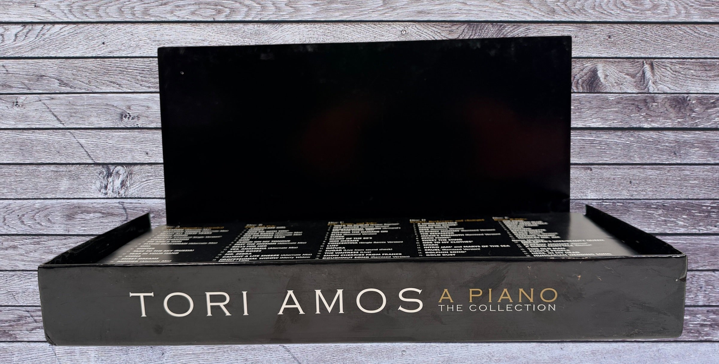 Complete Tori Amos A Piano The Collection 5CD deluxe Rhino box set with piano-key packaging and bonus B-sides in very good condition.