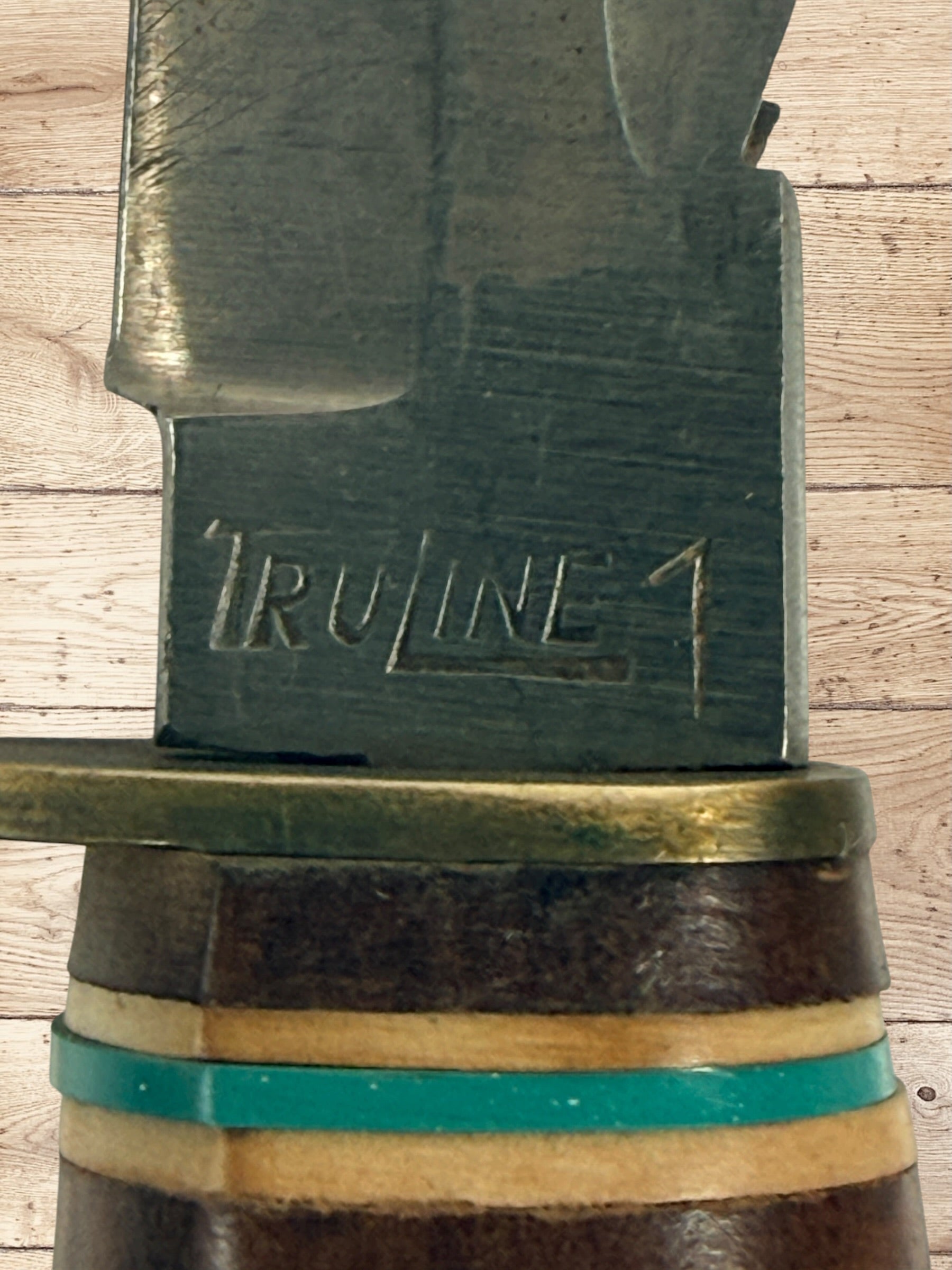 Vintage TRULINE Solingen Germany hunting knife with original leather sheath. Classic stacked leather fixed blade collectible from the mid-century era.