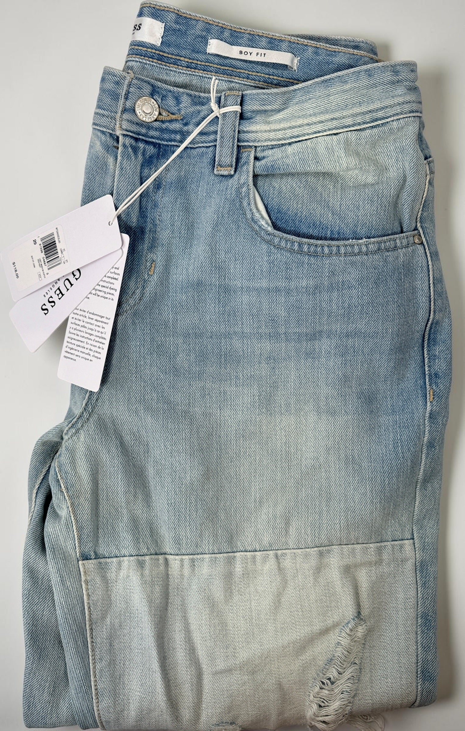 Jeans ajusté Guess pour garçon, denim délavé clair, taille 29.