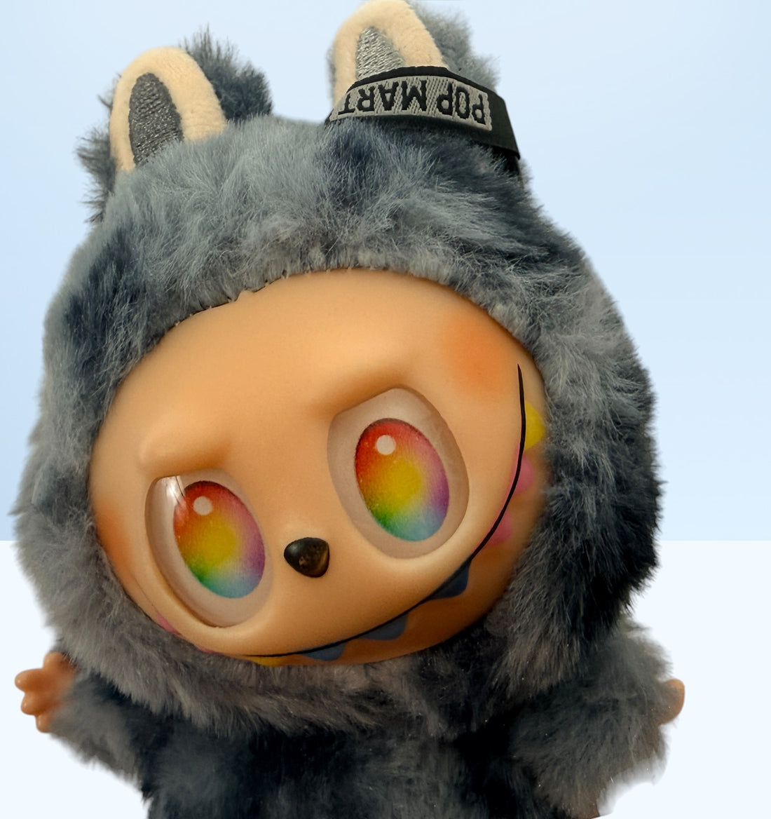 POP MART THE MONSTERS Labubu plush keychain with rainbow eyes and original tags. Collectible designer toy bag charm in excellent condition.