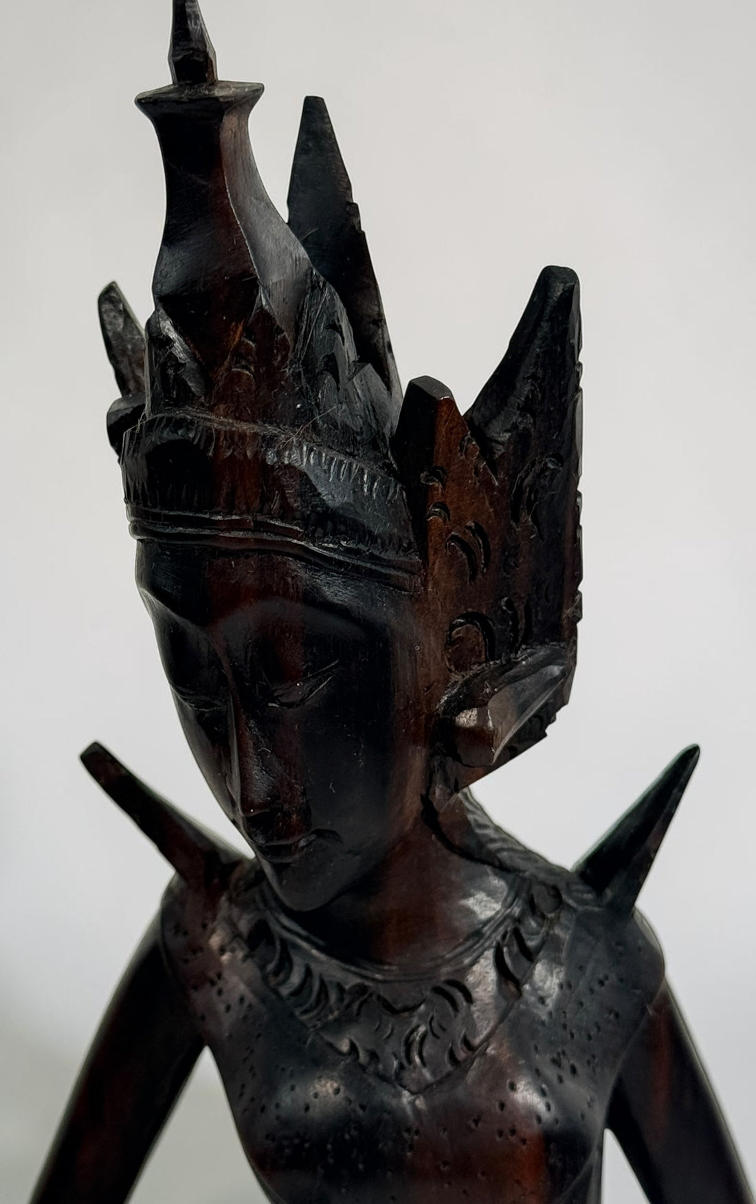 Vintage Balinese carved wood goddess statue from Indonesia. Handcrafted hardwood figure with detailed headdress, 13.5 inches tall.