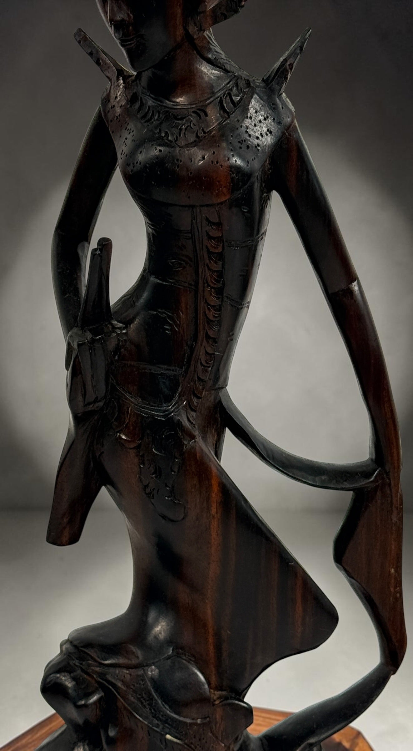Vintage Balinese carved wood goddess statue from Indonesia. Handcrafted hardwood figure with detailed headdress, 13.5 inches tall.