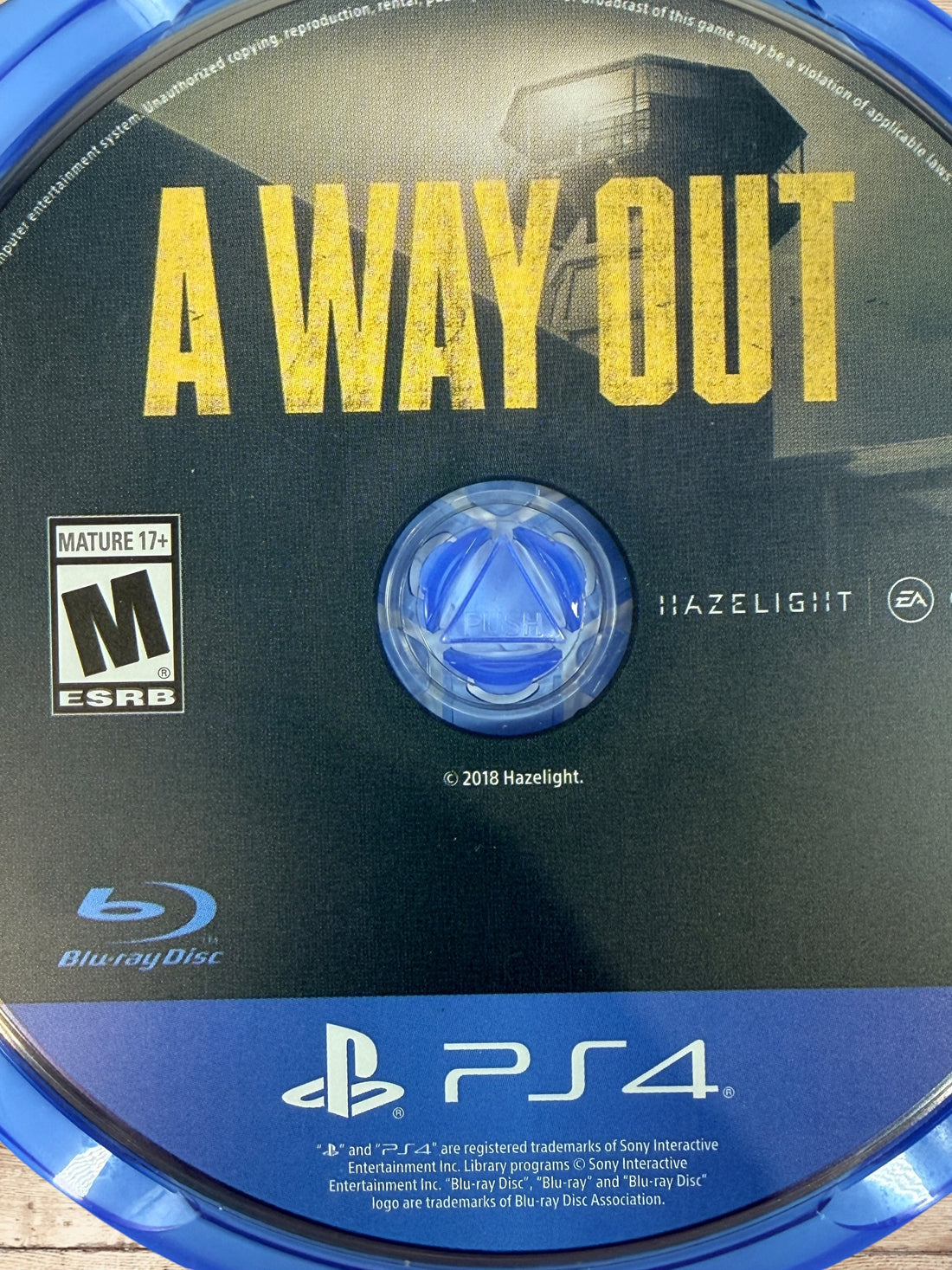 Complete PS4 copy of A Way Out co-op adventure game with case, artwork, insert, and original disc included.