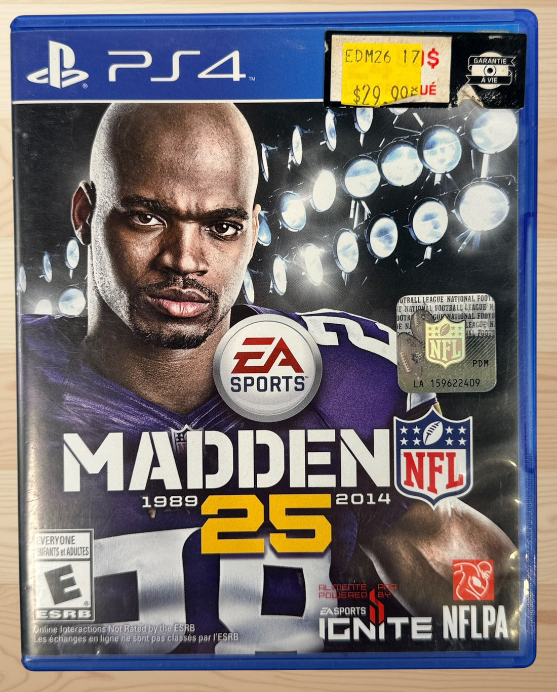 Complete-in-box PS4 Madden NFL 25 game with original case and disc. Classic EA Sports football title featuring Adrian Peterson.