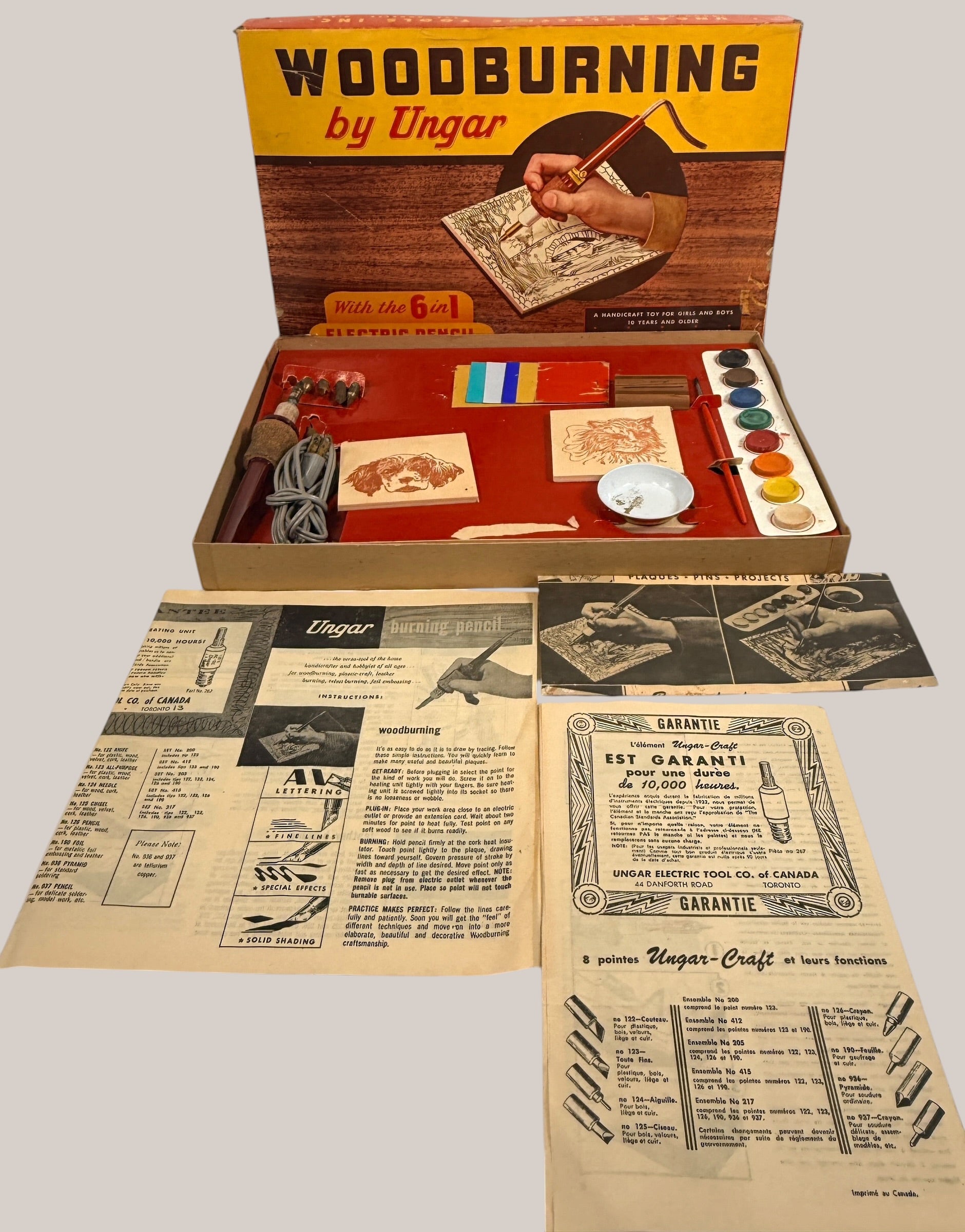 Vintage Ungar woodburning craft kit with original box, pyrography pencil, interchangeable tips, manuals, and accessories.