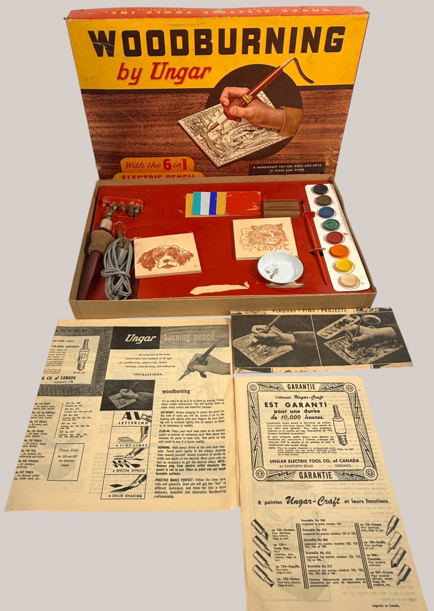 Vintage Ungar woodburning craft kit with original box, pyrography pencil, interchangeable tips, manuals, and accessories.