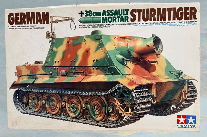 Vintage Tamiya 1/35 Sturmtiger model kit with original box, instructions, and sealed parts. Classic WWII German armor collectible made in Japan.