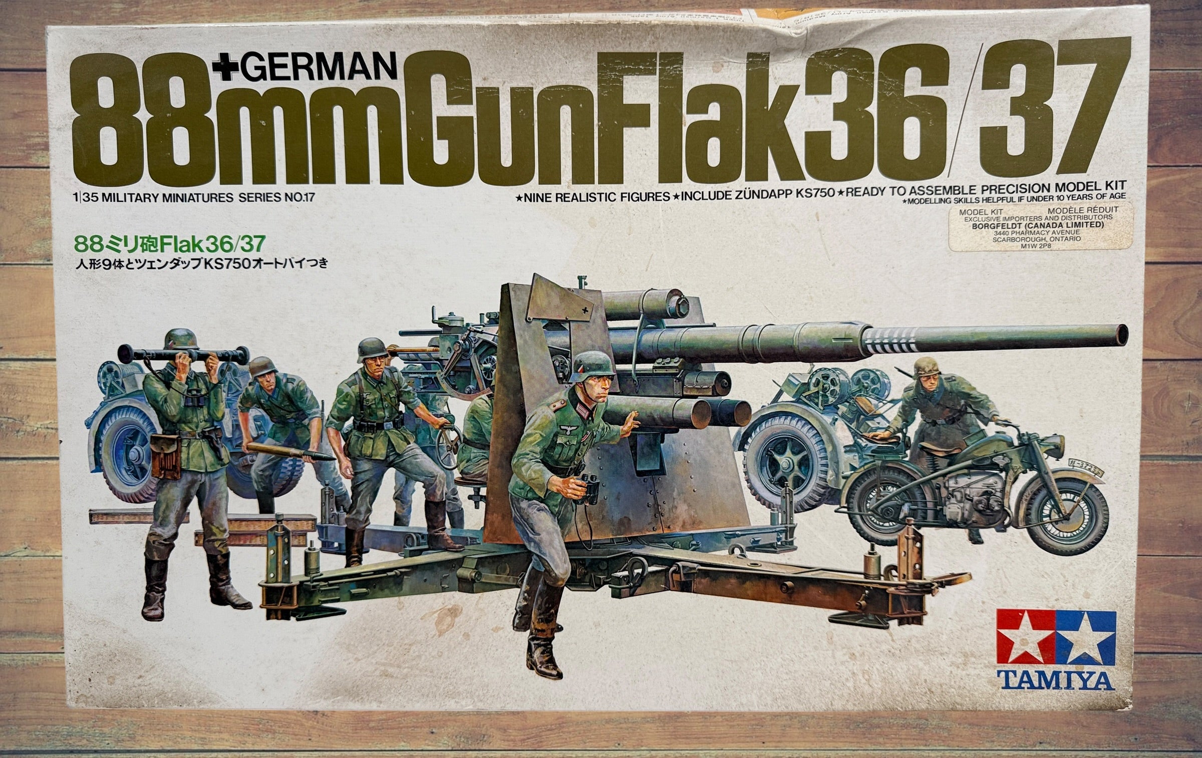 Vintage Tamiya 1/35 German 88mm Flak 36/37 model kit made in Japan. Rare early military miniature series with original box and unbuilt parts.