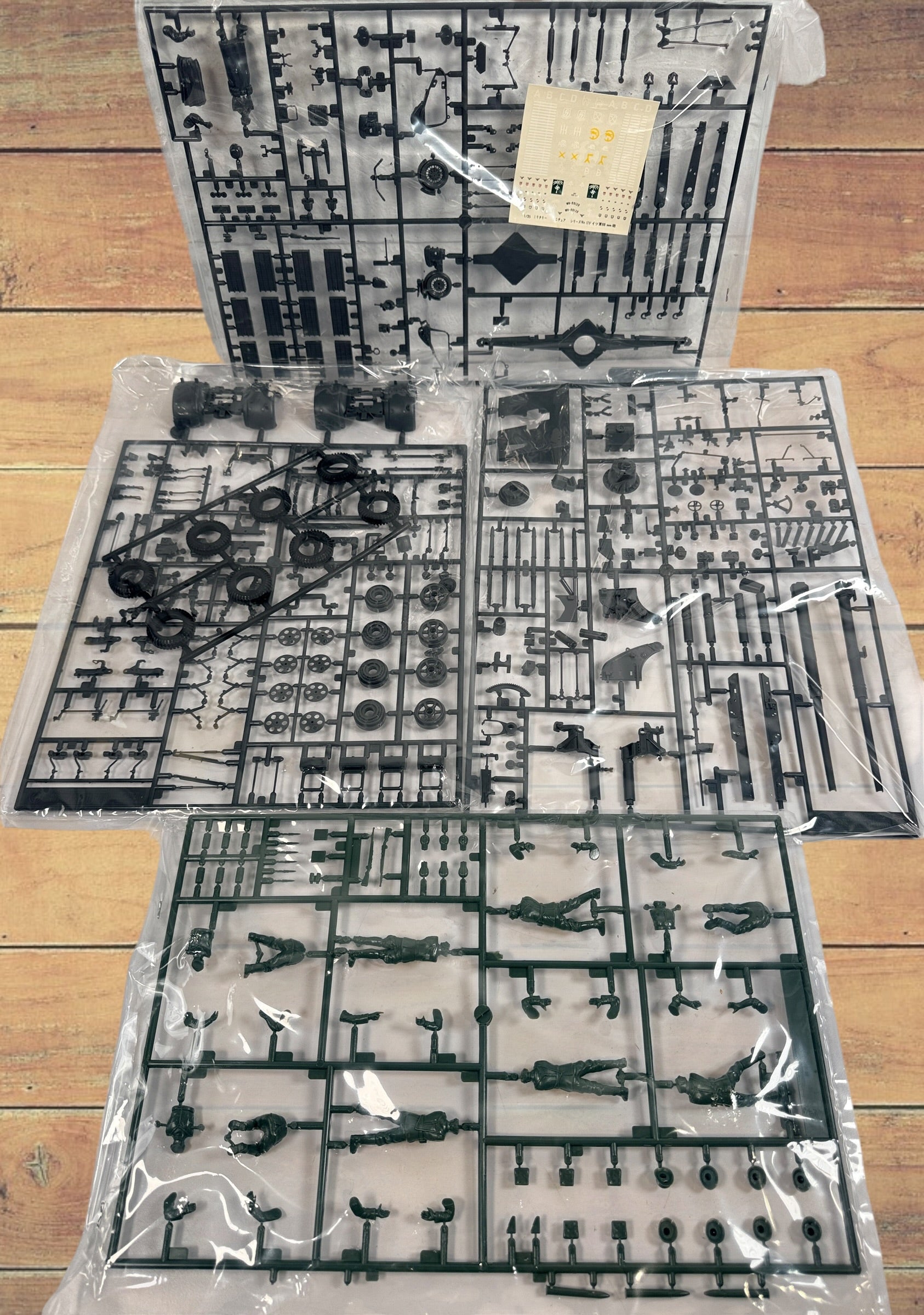 Vintage Tamiya 1/35 German 88mm Flak 36/37 model kit made in Japan. Rare early military miniature series with original box and unbuilt parts.