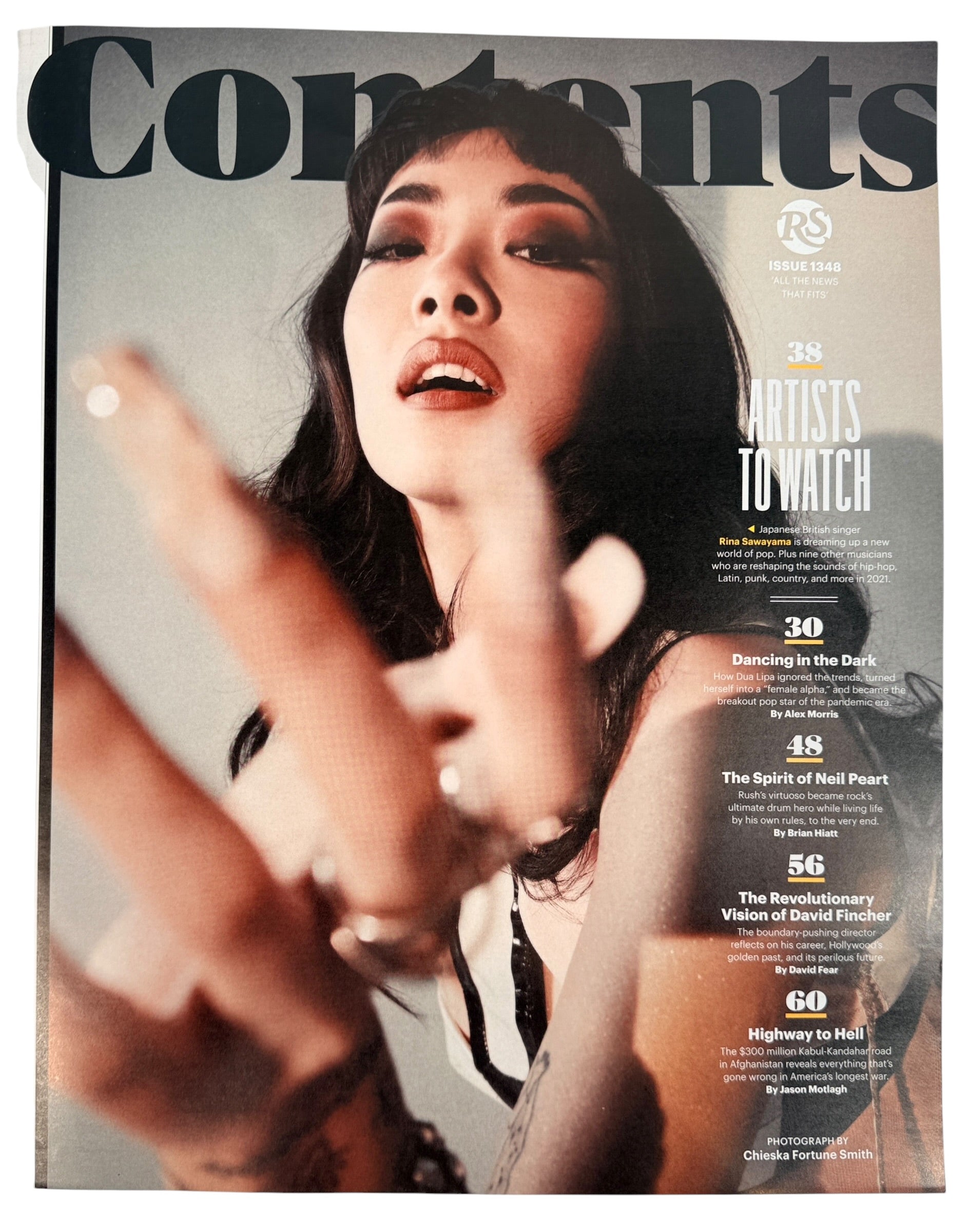 Rolling Stone February 2021 magazine featuring Dua Lipa cover story and collectible pop culture content.