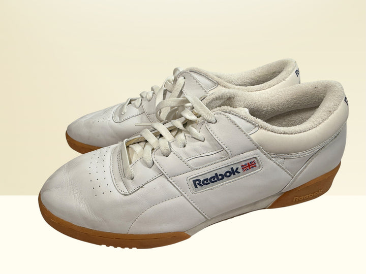 Vintage Reebok Classic leather sneakers size 14 with gum soles and retro white leather styling. Rare larger size Y2K casual athletic shoes.