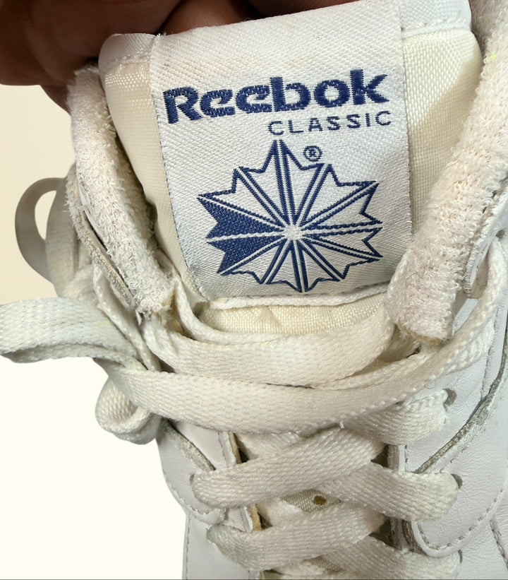 Vintage Reebok Classic leather sneakers size 14 with gum soles and retro white leather styling. Rare larger size Y2K casual athletic shoes.