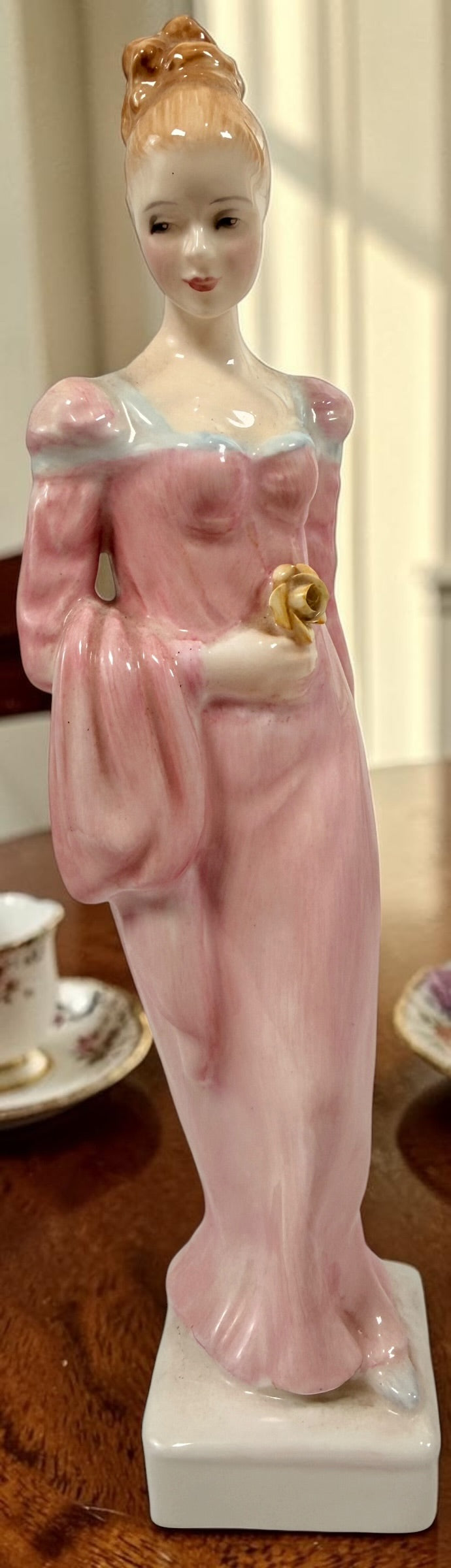Vintage Royal Doulton Daphne HN2268 figurine by Peggy Davies. Classic English bone china collectible featuring elegant pink and blue gown details.