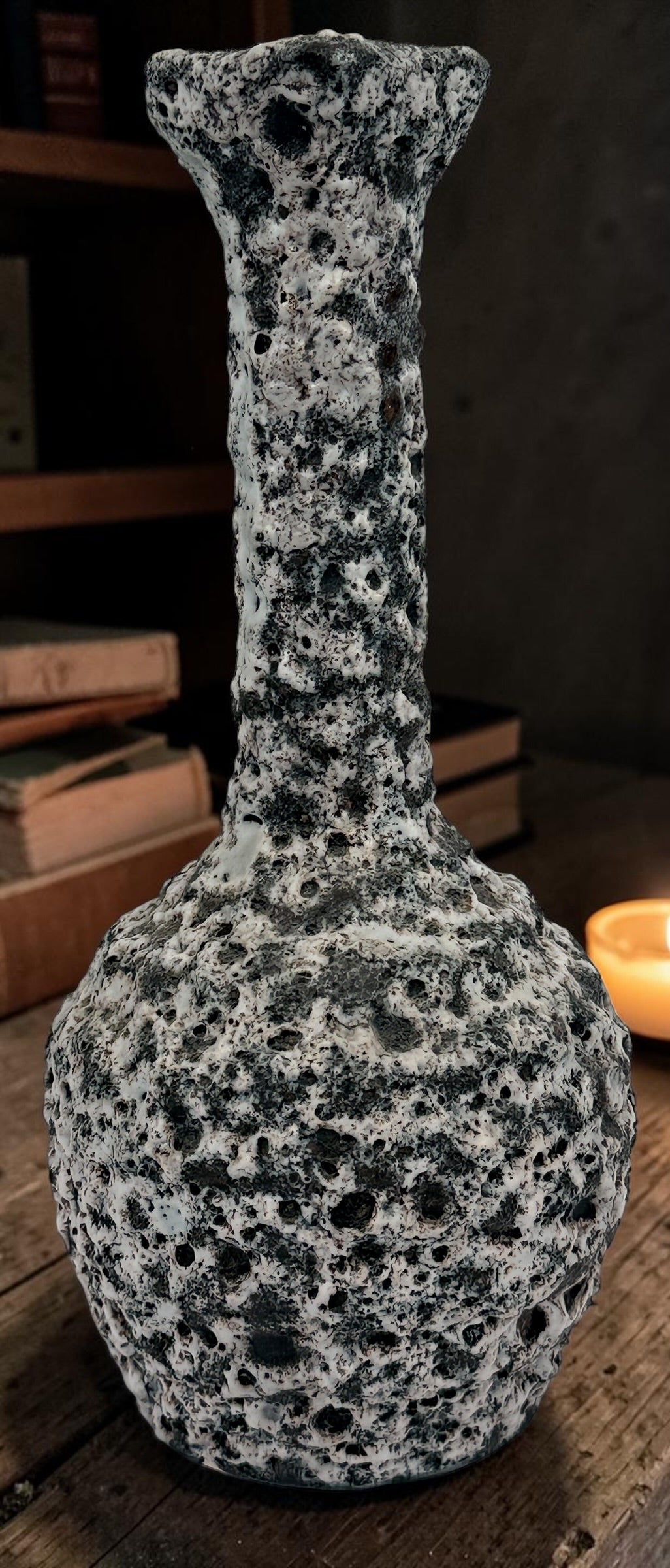 Vintage French brutalist lava glaze vase by Puy Mary featuring volcanic black and white texture and sculptural 1970s ceramic design.