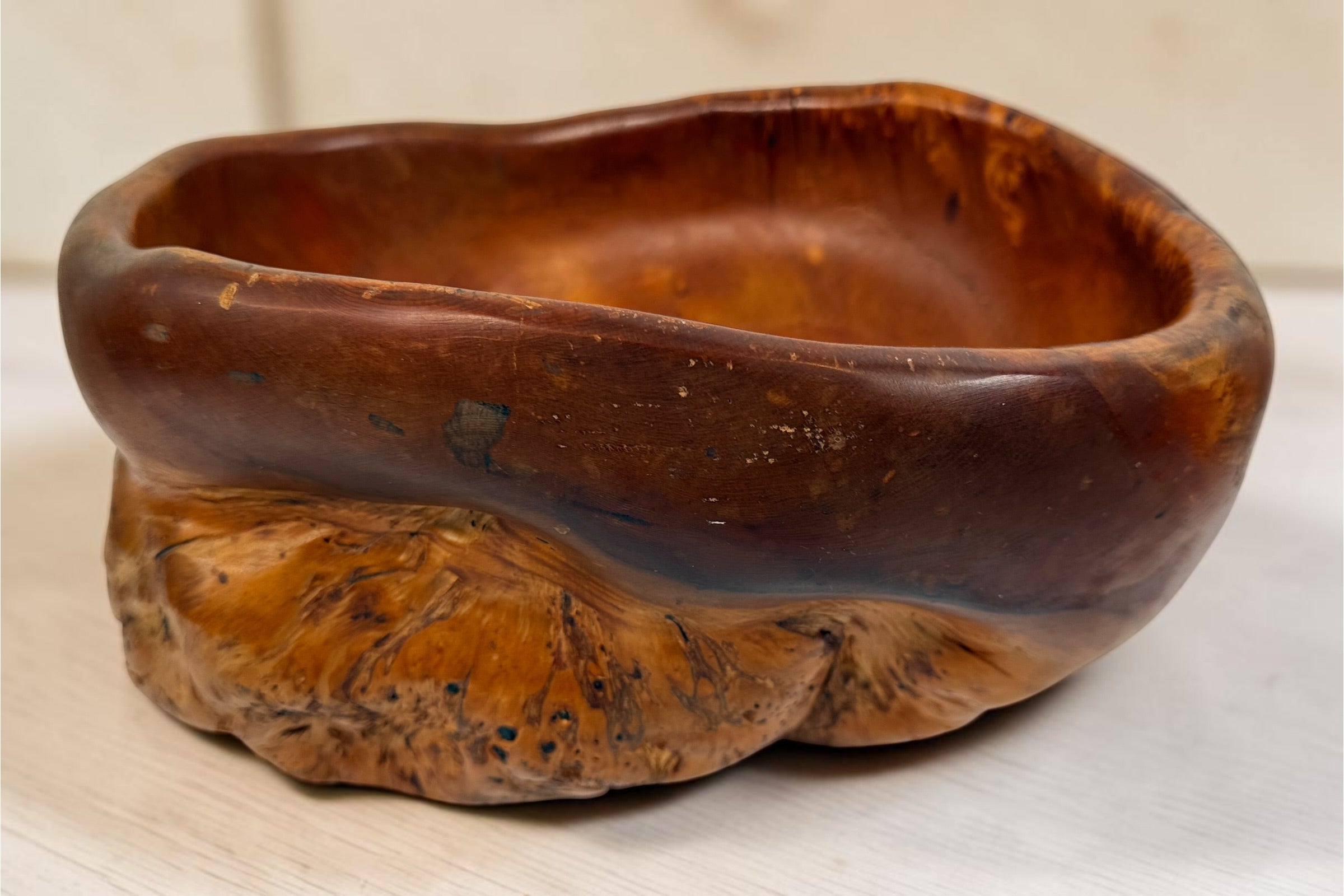 Hand-carved yellow cedar burl bowl signed Totino Bob and dated 1995. Sculptural Pacific Northwest studio craft centerpiece with organic modern style.