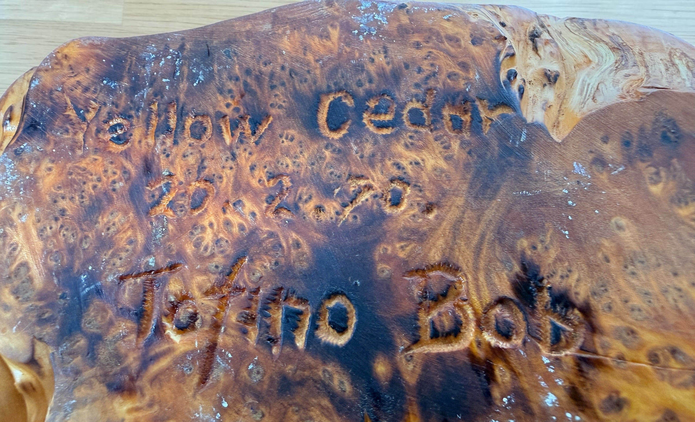 Hand-carved yellow cedar burl bowl signed Totino Bob and dated 1970. Sculptural Pacific Northwest studio craft centerpiece with organic modern style.