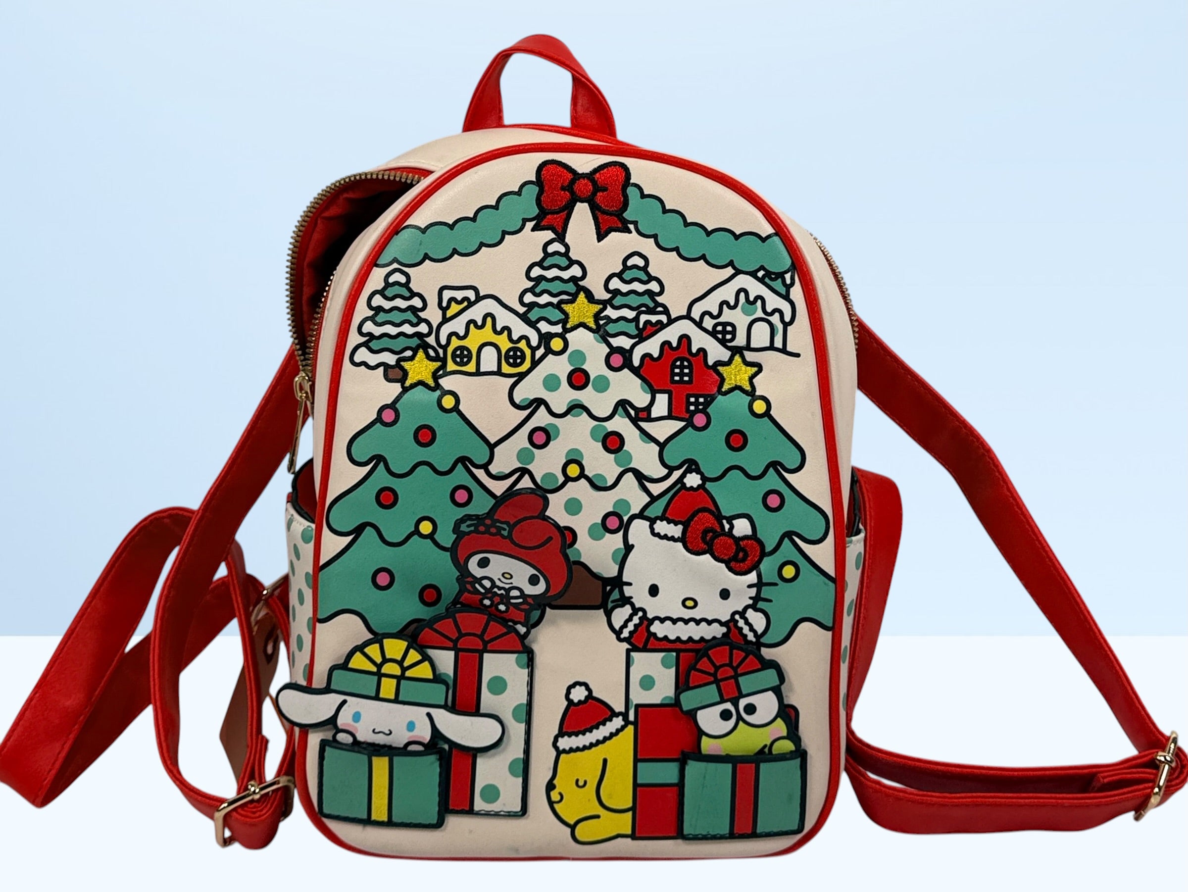 Her Universe Hello Kitty Christmas mini backpack featuring Sanrio characters in a festive holiday design with adjustable straps and kawaii collectible style.