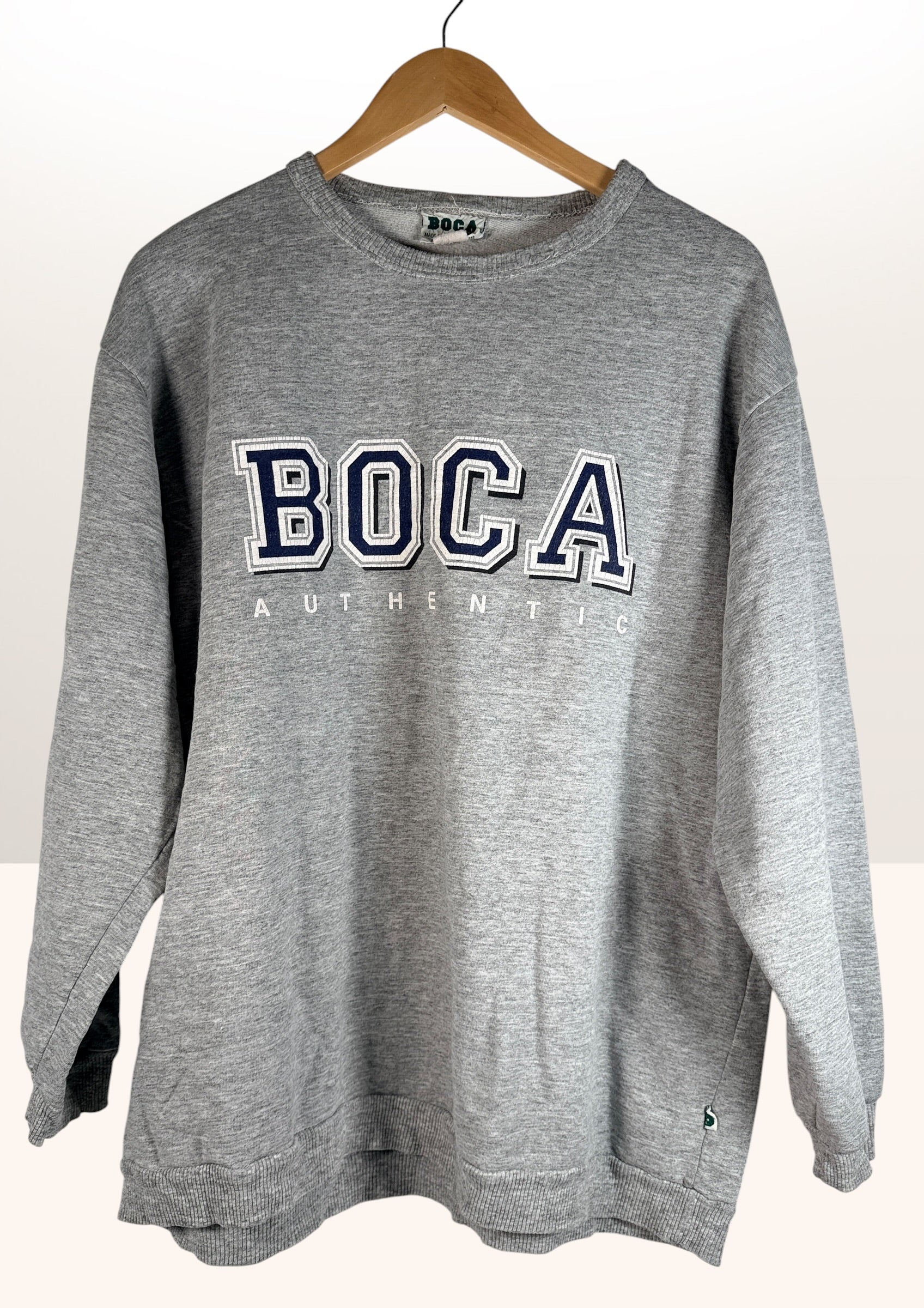 Vintage BOCA Canadian-made crewneck sweatshirt in grey with varsity logo styling and relaxed 90s athletic wear fit.