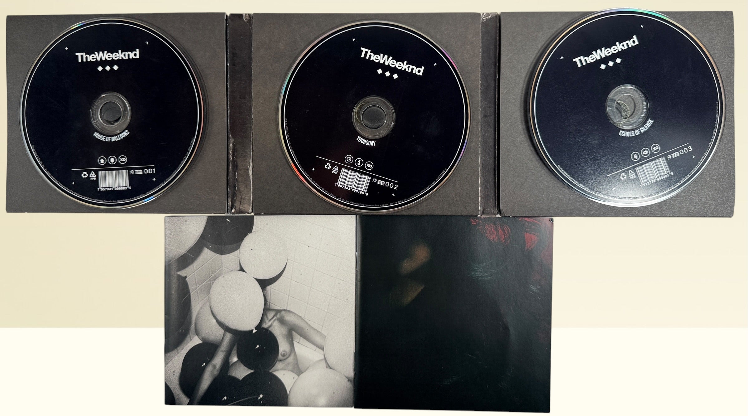 Official 2012 The Weeknd Trilogy 3CD deluxe XO Canada box set with House of Balloons, Thursday, and Echoes of Silence in foldout digipak packaging.
