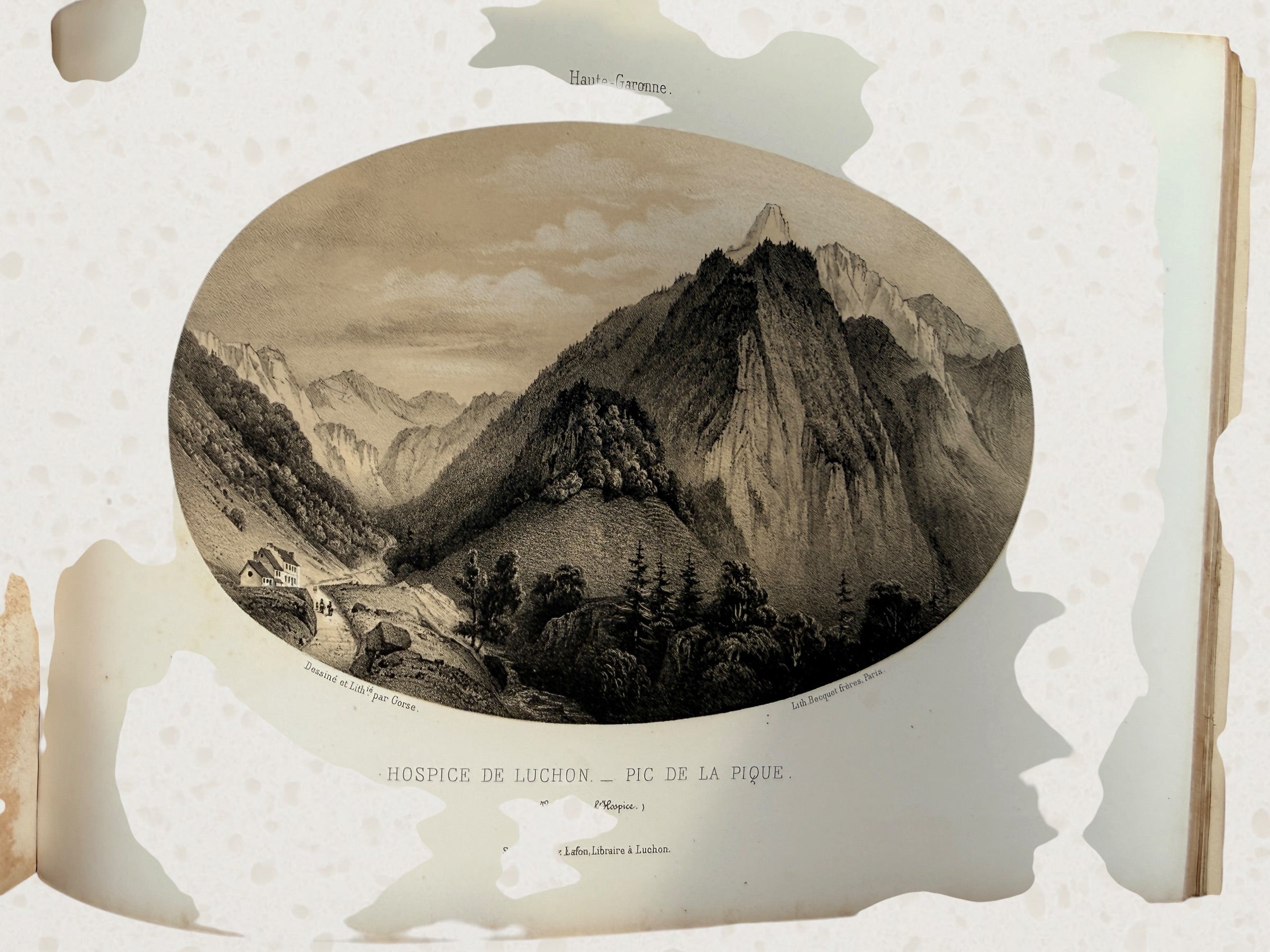 Antique French lithograph album featuring scenic Pyrenees views of Luchon, original 19th-century plates, fold-outs, and gilt decorative binding.