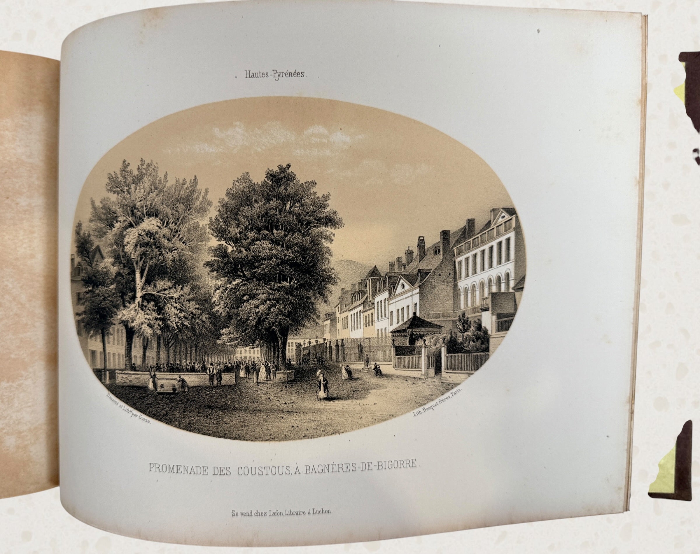 Antique French lithograph album featuring scenic Pyrenees views of Luchon, original 19th-century plates, fold-outs, and gilt decorative binding.