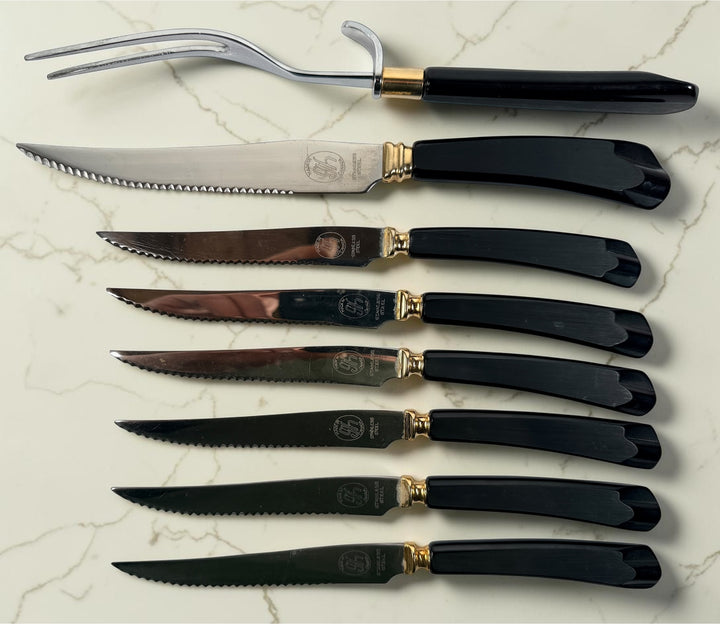 Vintage 1960s Glo-Hill Modavanti carving set with steak knives. Canadian MCM cutlery featuring black handles and gold-tone accents.