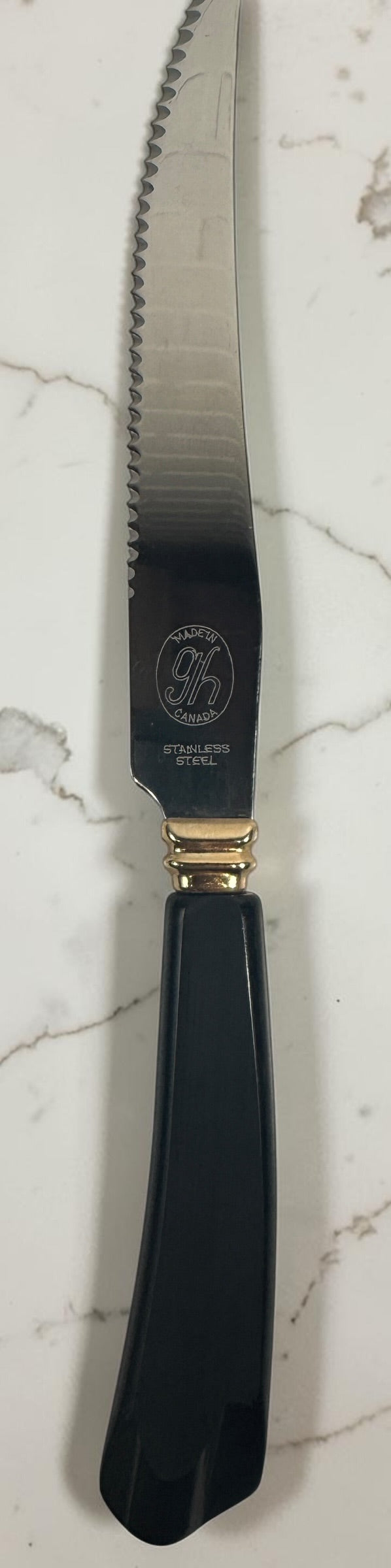 Vintage 1960s Glo-Hill Modavanti carving set with steak knives. Canadian MCM cutlery featuring black handles and gold-tone accents.