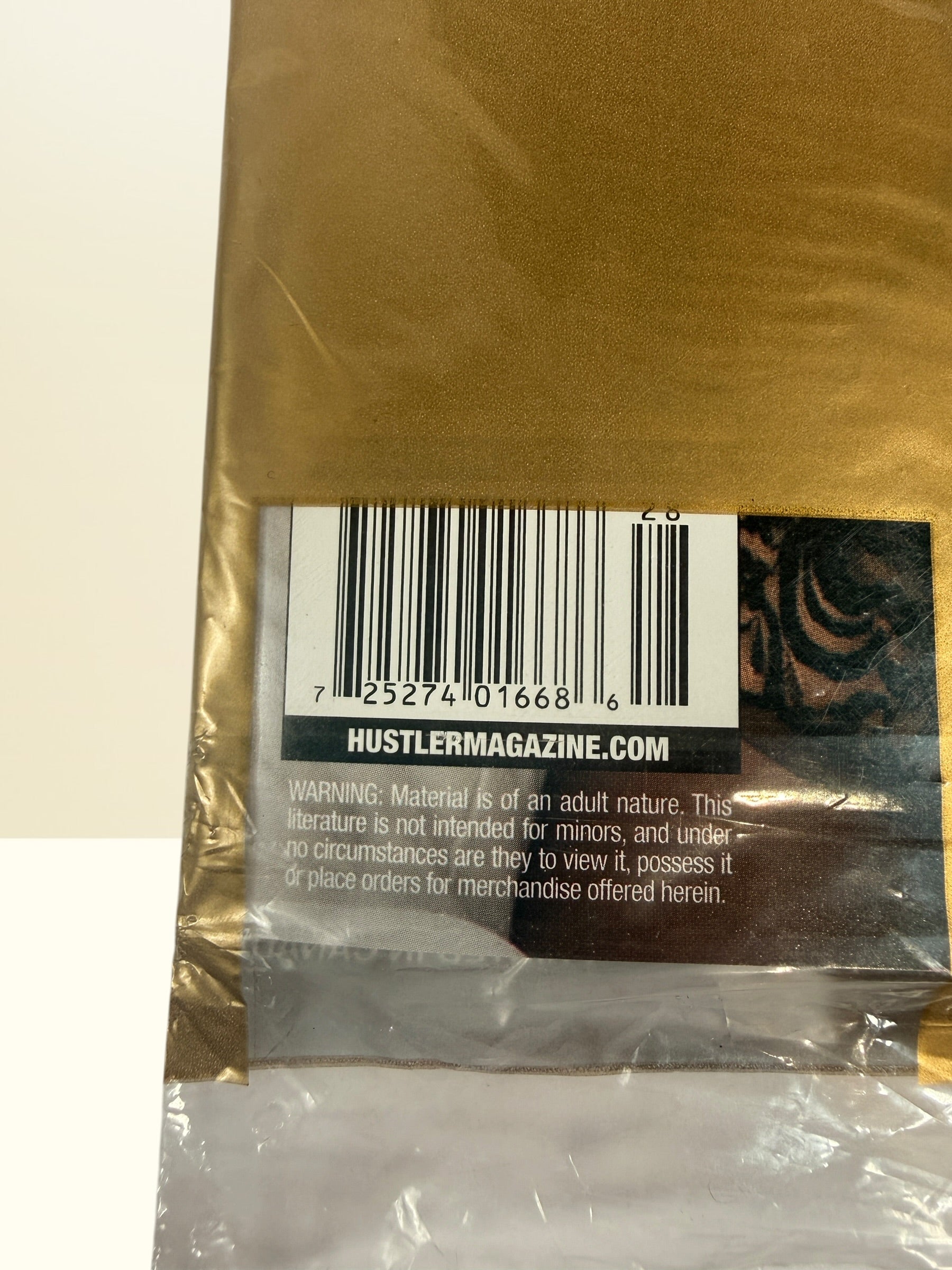 Sealed January 2018 Hustler Magazine featuring Melody Wylde Beaver of the Year in original gold privacy wrap. Collectible adult publication.