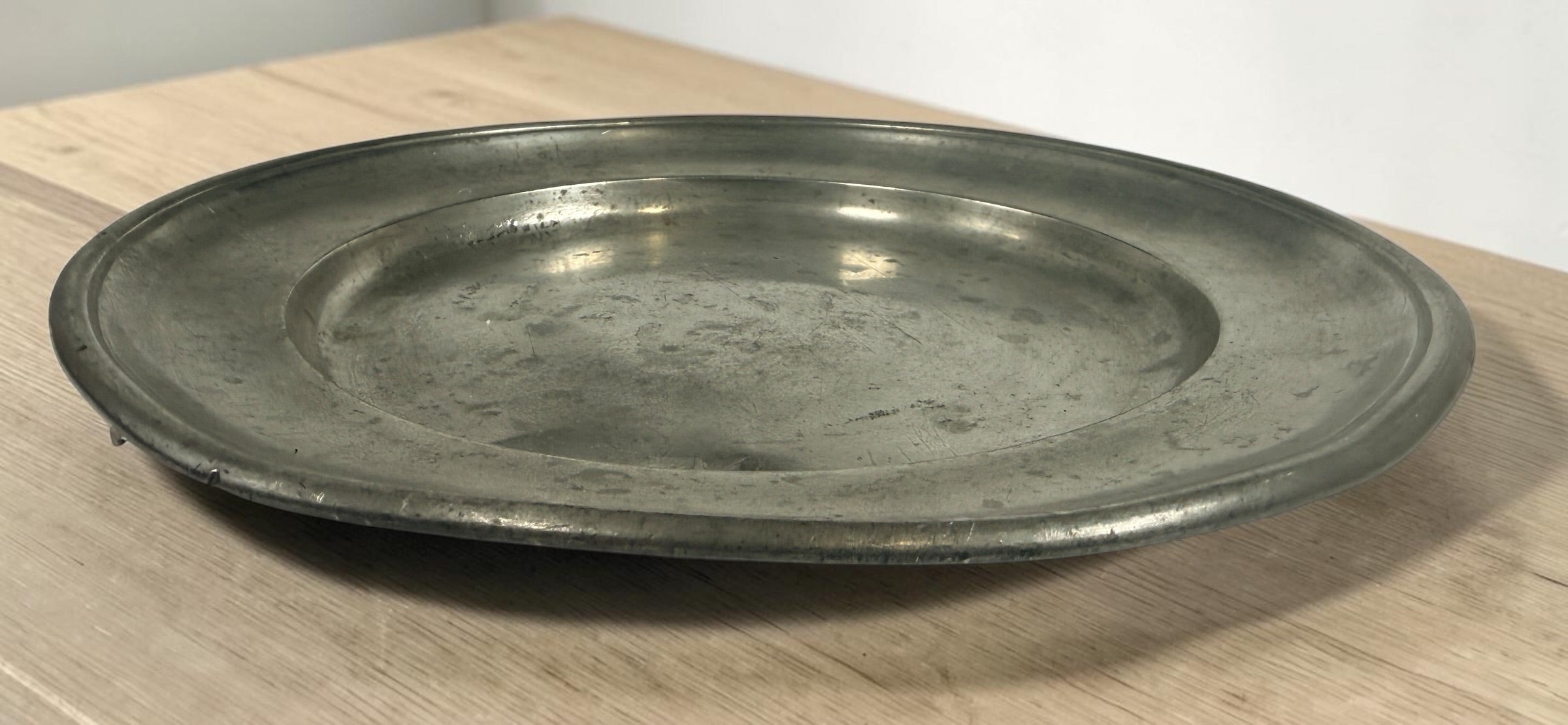 Antique continental pewter charger plate with rare angel marks and K. Winkel touchmarks. Primitive European pewter platter with aged patina.