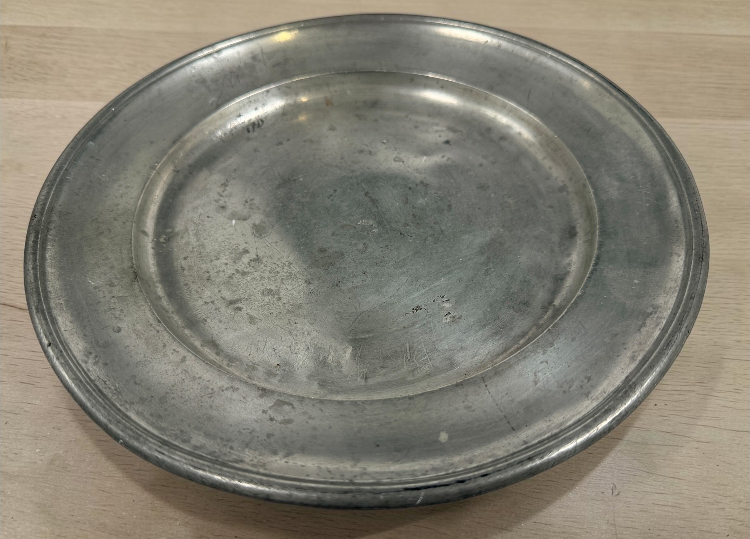 Antique continental pewter charger plate with rare angel marks and K. Winkel touchmarks. Primitive European pewter platter with aged patina.