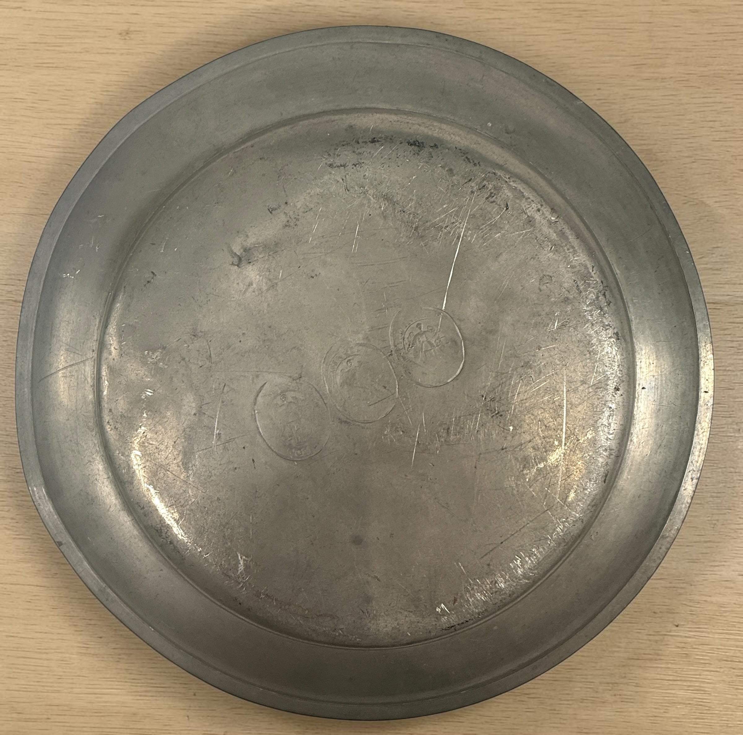 Antique continental pewter charger plate with rare angel marks and K. Winkel touchmarks. Primitive European pewter platter with aged patina.