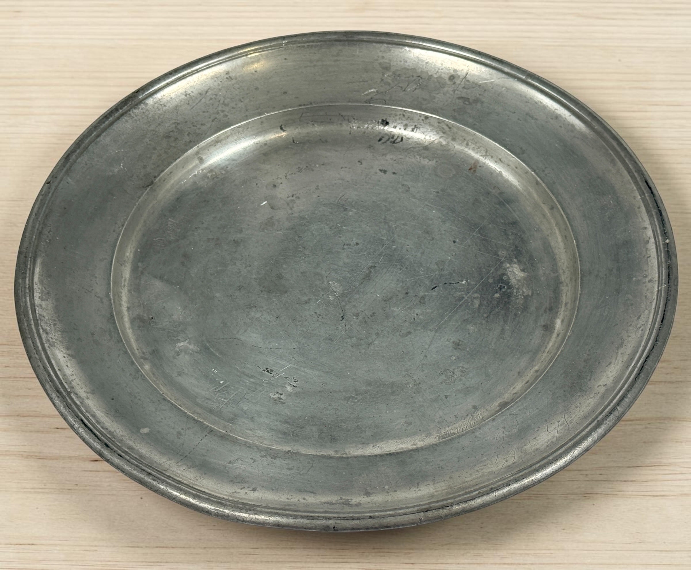 Antique continental pewter charger plate with rare angel marks and K. Winkel touchmarks. Primitive European pewter platter with aged patina.