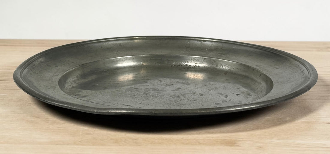 Antique continental pewter charger plate with rare angel marks and K. Winkel touchmarks. Primitive European pewter platter with aged patina.