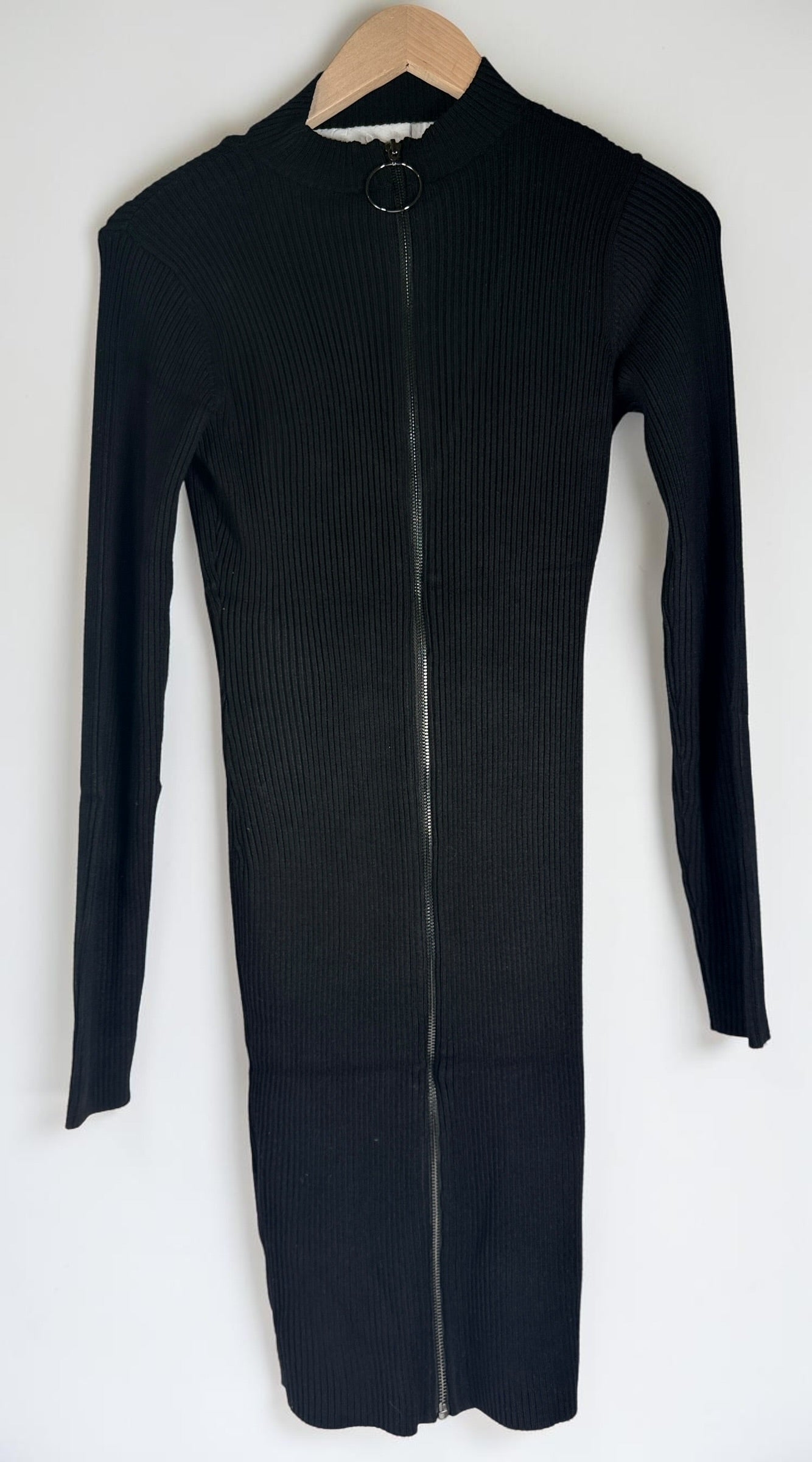GUESS black ribbed knit bodycon dress in size medium, new with tags featuring convertible mock neck and zipper detail.