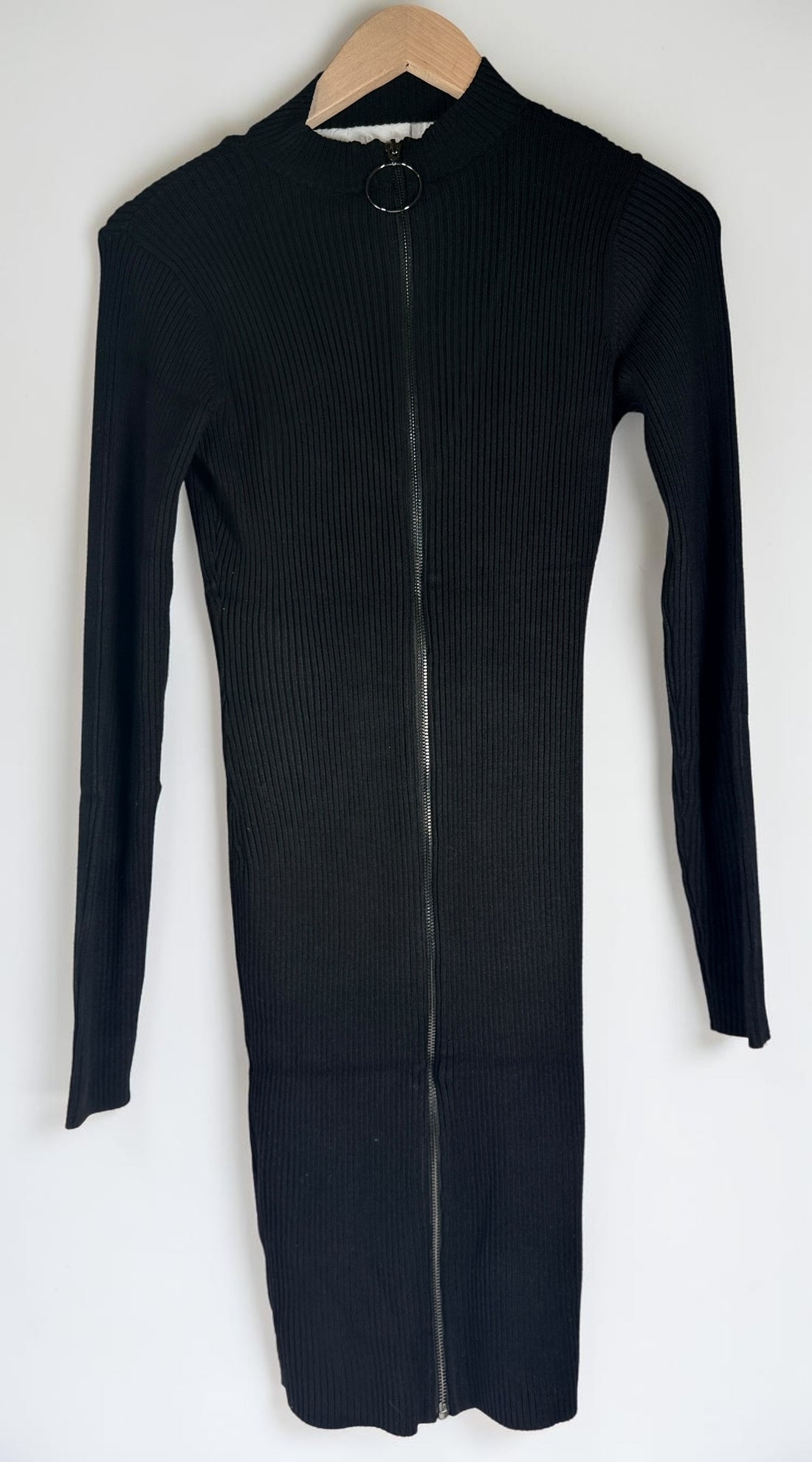 GUESS black ribbed knit bodycon dress in size medium, new with tags featuring convertible mock neck and zipper detail.
