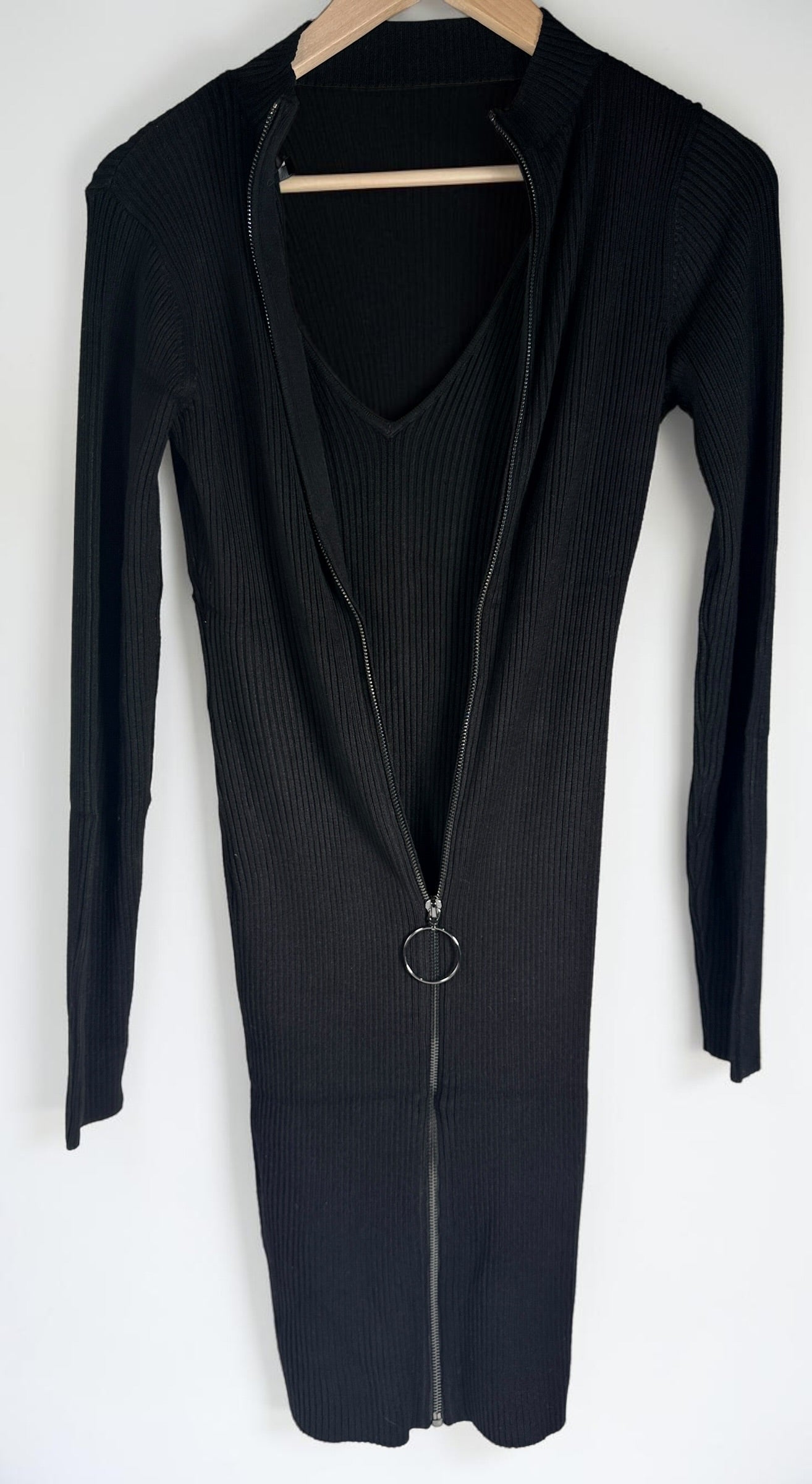 GUESS black ribbed knit bodycon dress in size medium, new with tags featuring convertible mock neck and zipper detail.