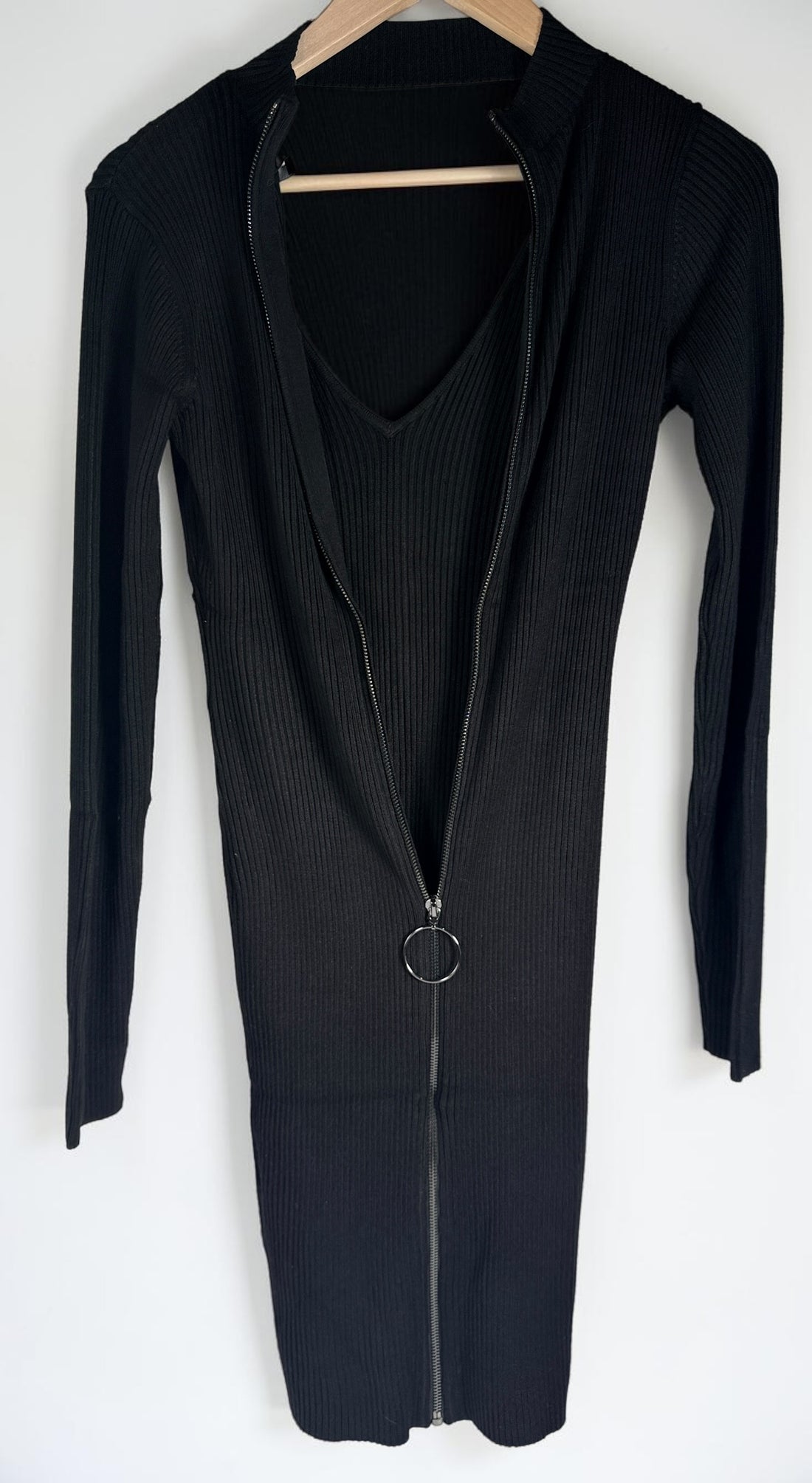 GUESS black ribbed knit bodycon dress in size medium, new with tags featuring convertible mock neck and zipper detail.
