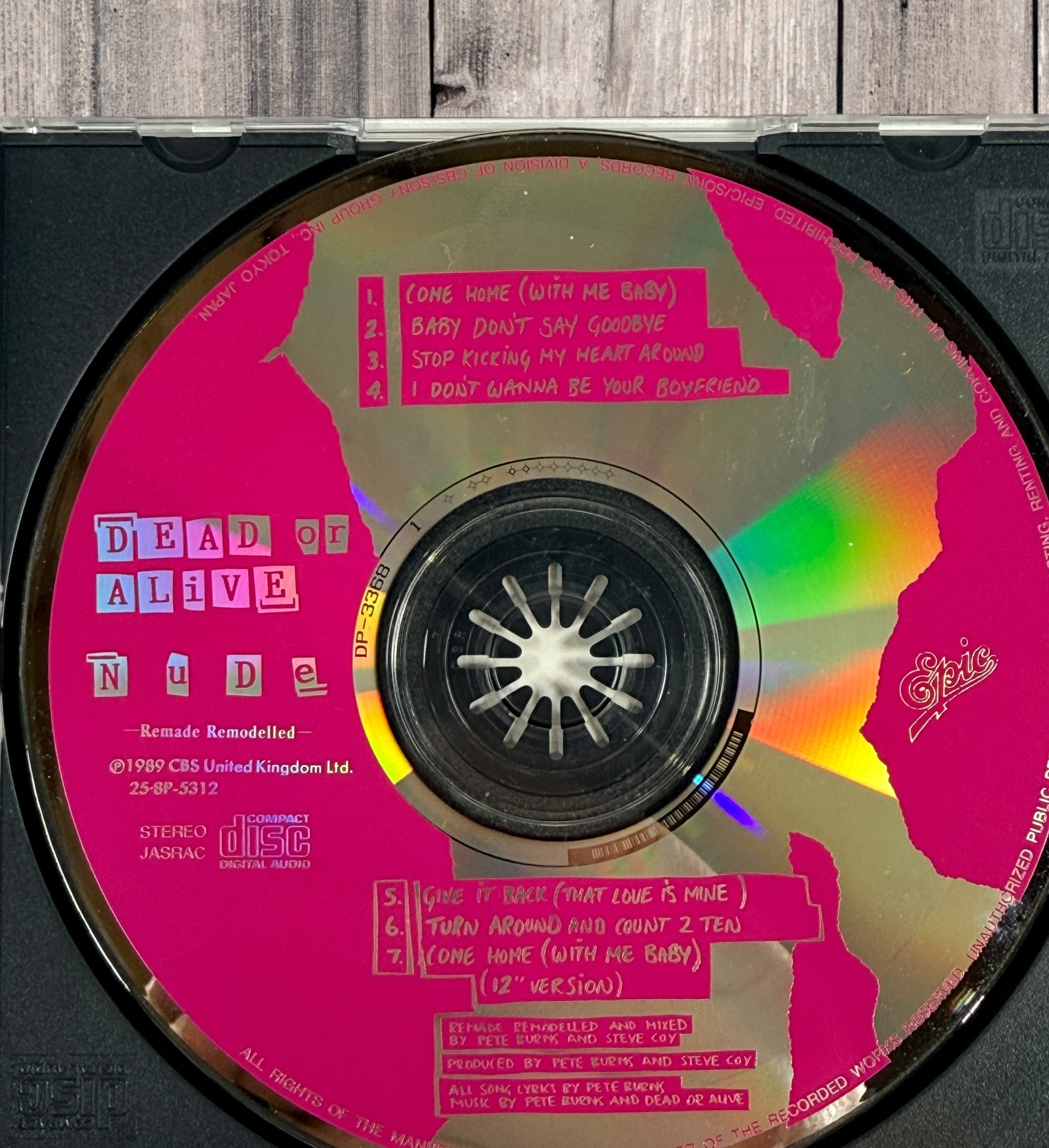 1989 Japanese Dead Or Alive Nude Remade Remodelled CD EP with original obi strip. Rare Pete Burns synth-pop collectible from Epic Sony Japan.