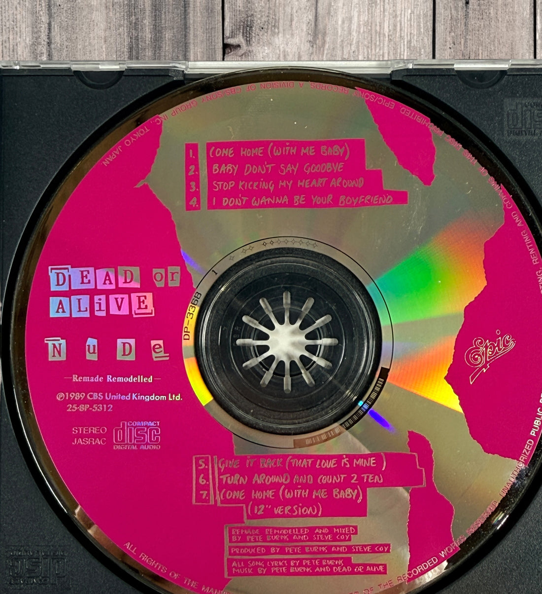 1989 Japanese Dead Or Alive Nude Remade Remodelled CD EP with original obi strip. Rare Pete Burns synth-pop collectible from Epic Sony Japan.