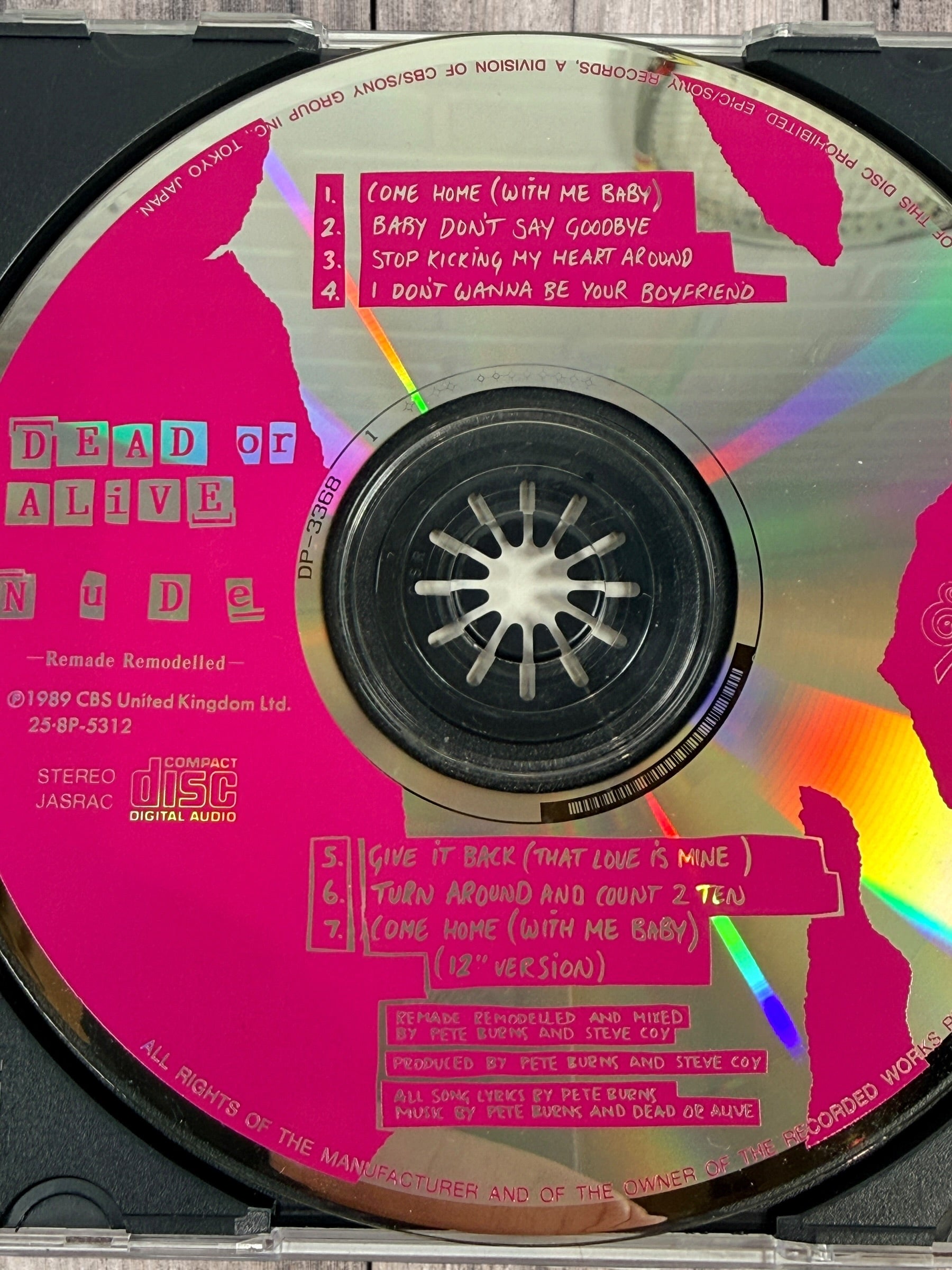 1989 Japanese Dead Or Alive Nude Remade Remodelled CD EP with original obi strip. Rare Pete Burns synth-pop collectible from Epic Sony Japan.