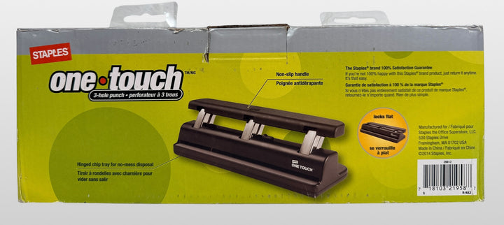 Staples One-Touch 3-hole punch model 26612 with 20-sheet capacity in open-box condition. Includes original packaging and locking flat design.